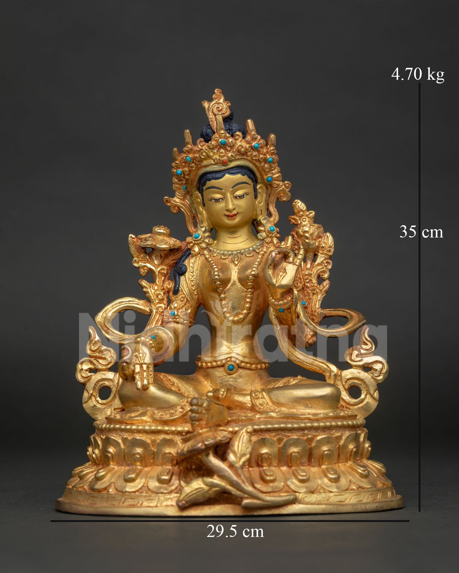 Handcrafted Green Tara statue with 24K gold painted face by Newari artisans from Patan Nepal.