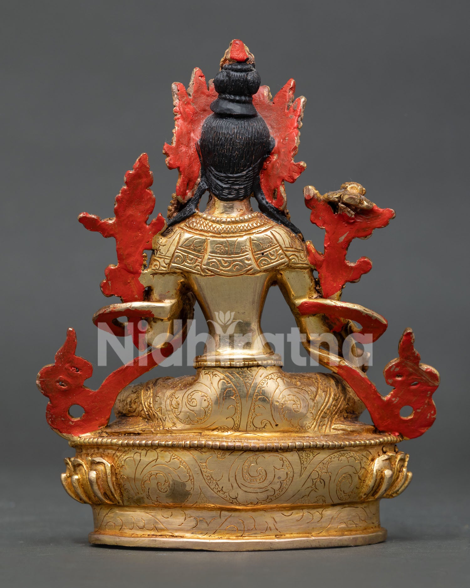 Handcrafted Green Tara statue with a gold-gilded copper body from Patan, Nepal.