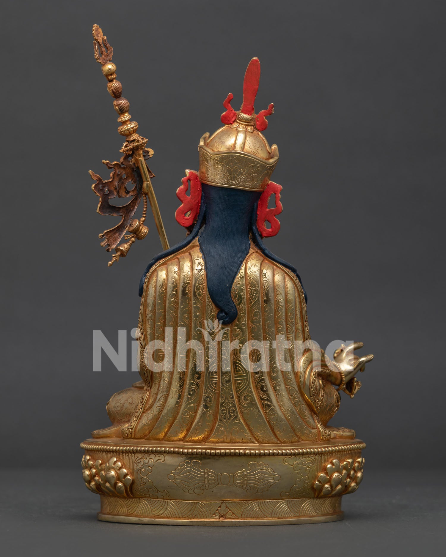 Handcrafted Guru Rinpoche Statue Back View with Floral Garments and Copper Body.