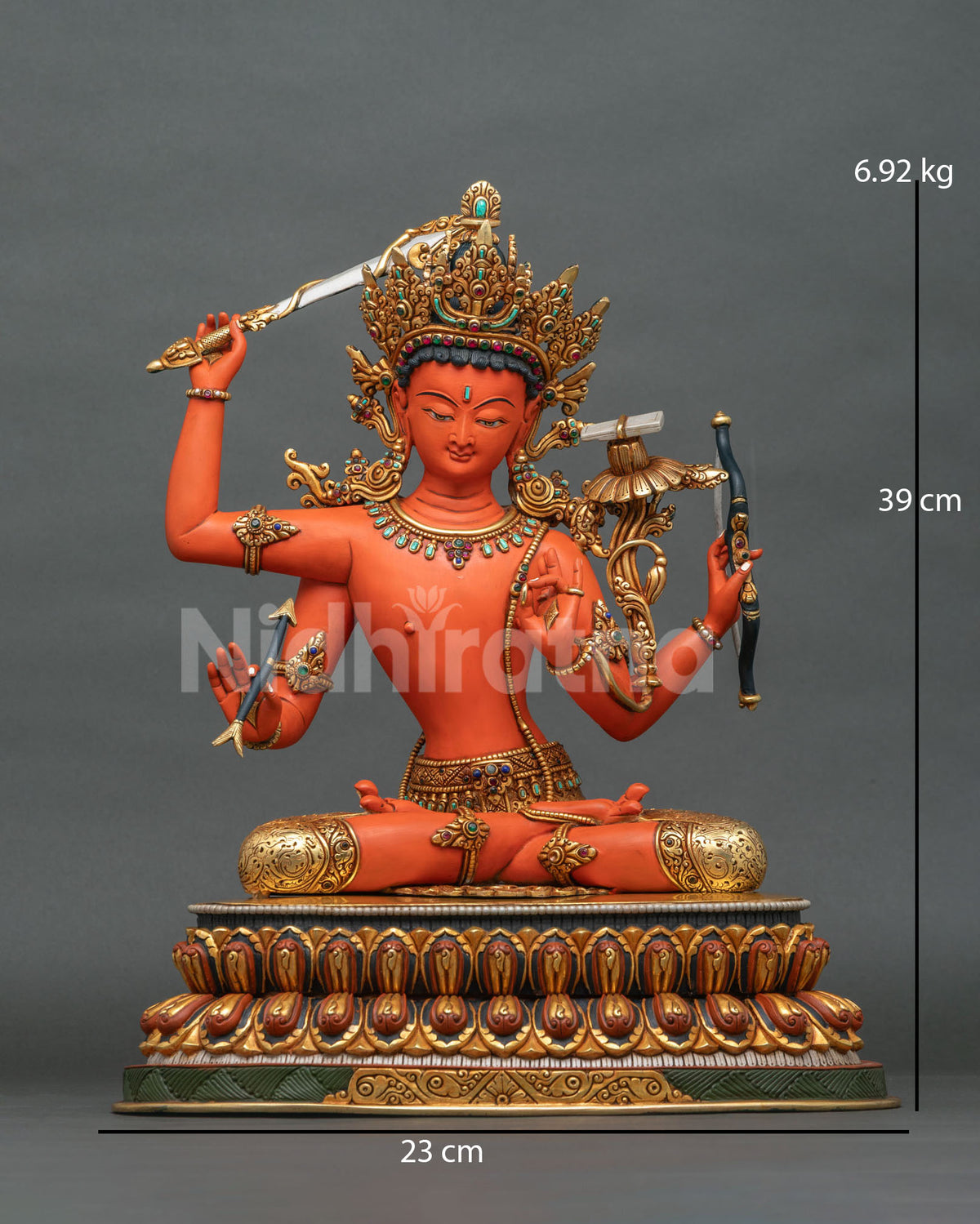 Handcrafted Maha Manjushri statue from Nepal, front view with flaming sword, bow and arrow on lotus seat