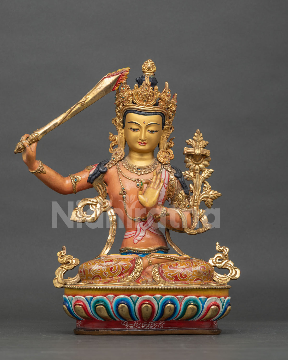 Handcrafted Manjushri statue with acrylic painted body and gold painted details.