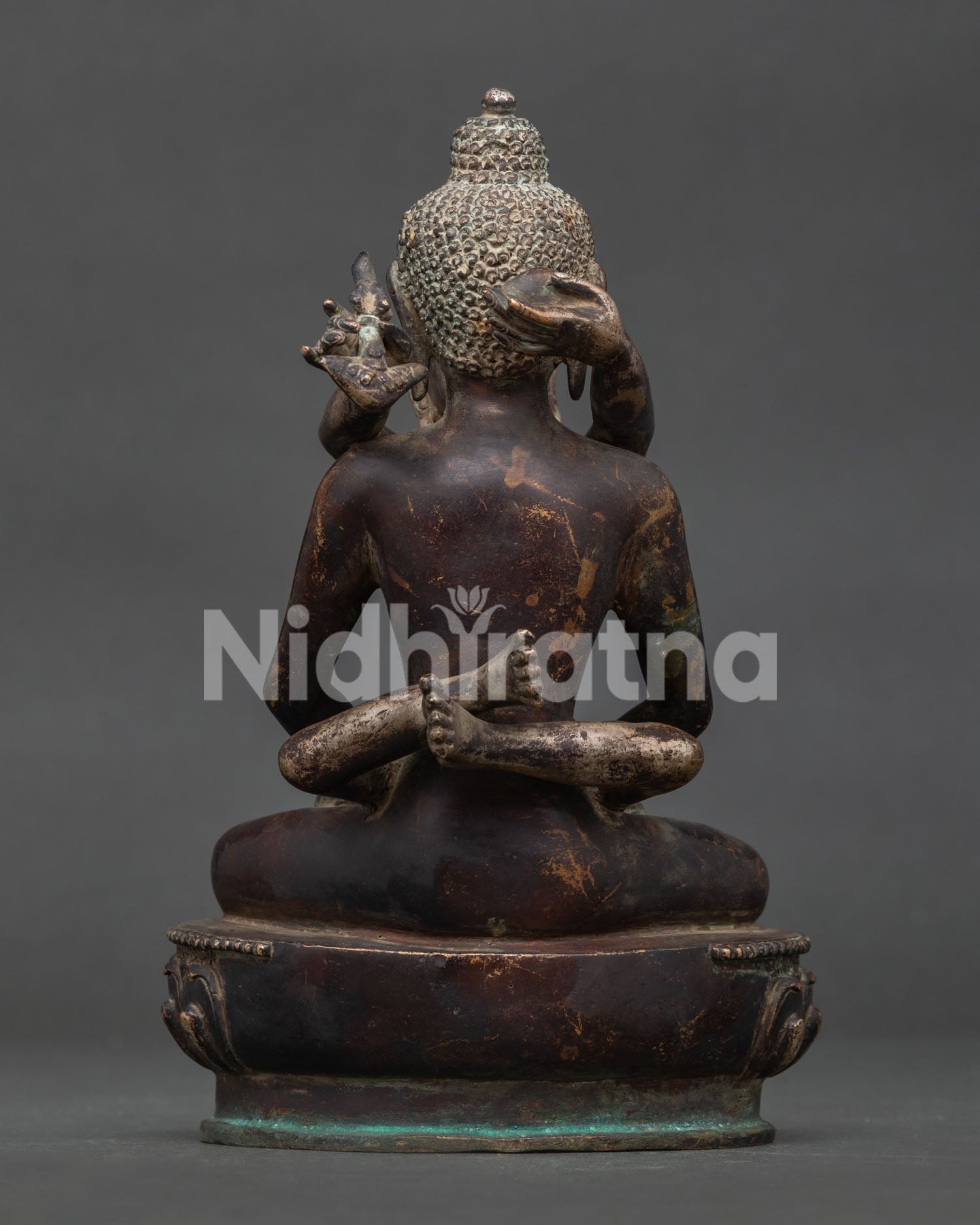 Handcrafted Samantabhadra with consort statue showing lotus throne and antique oxidized finish.