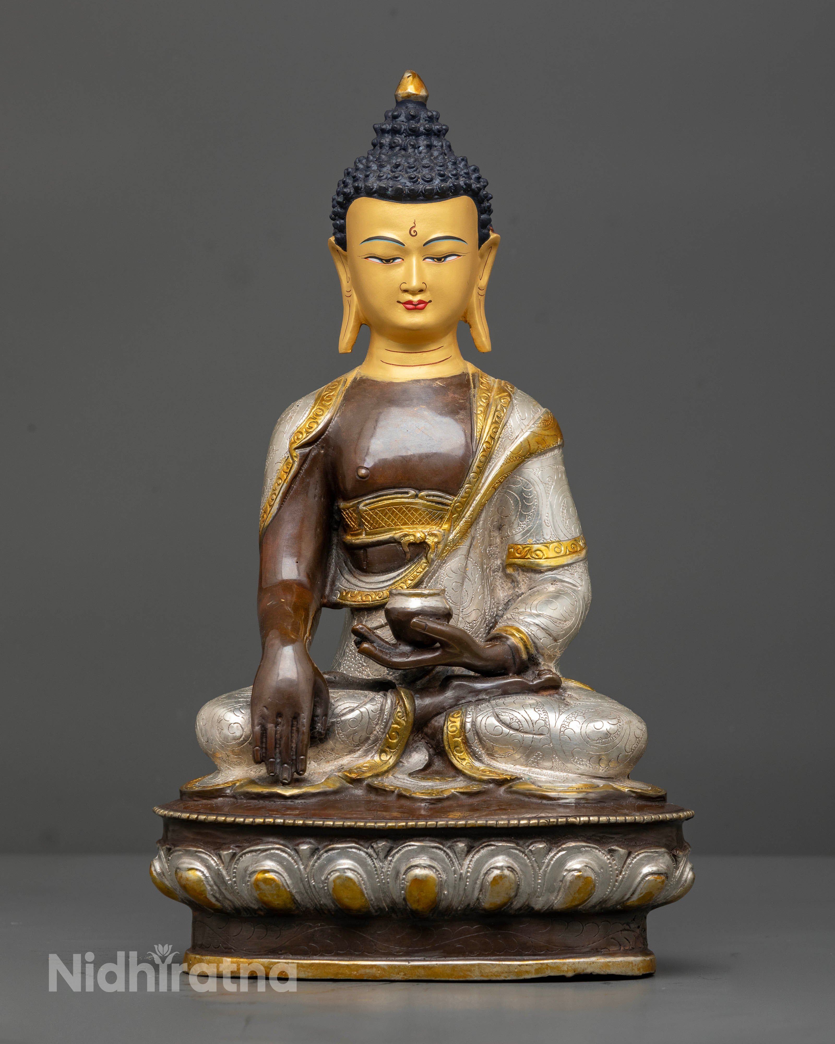 Handcrafted Shakyamuni Buddha statue from Nepal in copper with oxidized and silver plating