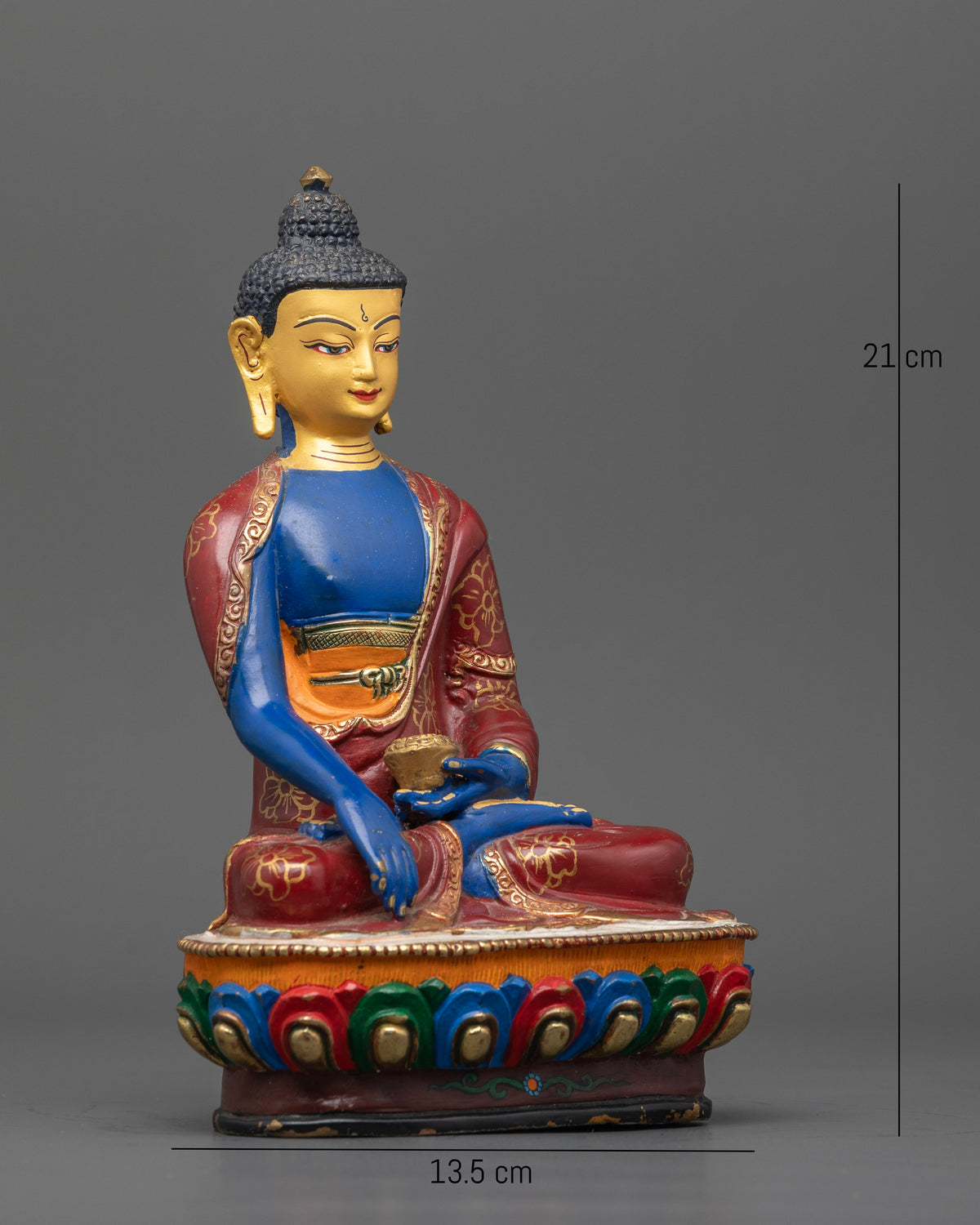 Handcrafted Shakyamuni Buddha statue with multicolor lotus pedestal.
