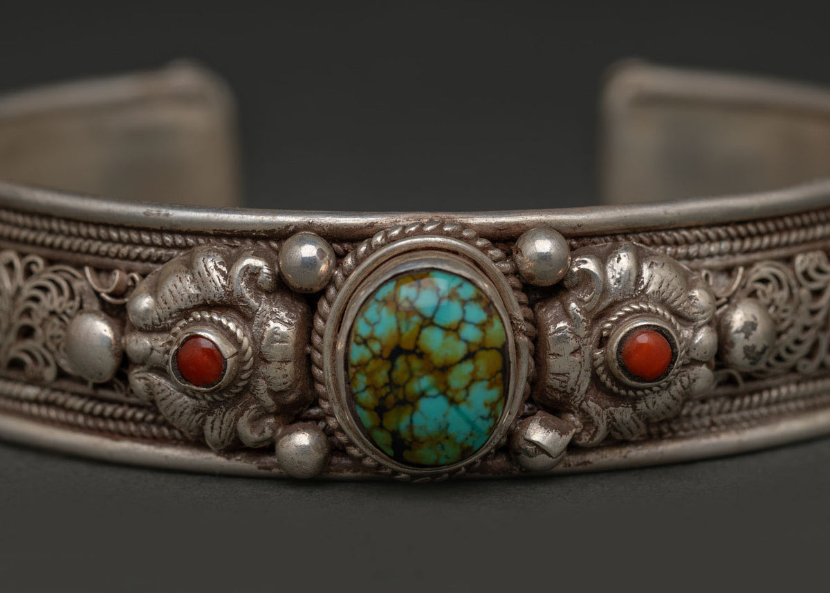 Handcrafted Tibetan bracelet with silver filigree and hand set turquoise stone