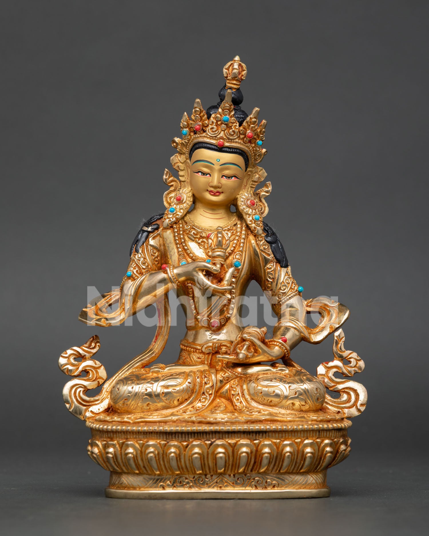 Handcrafted Vajrasattva Statue from Nepal made of copper with gold gilding and semi precious stone details.