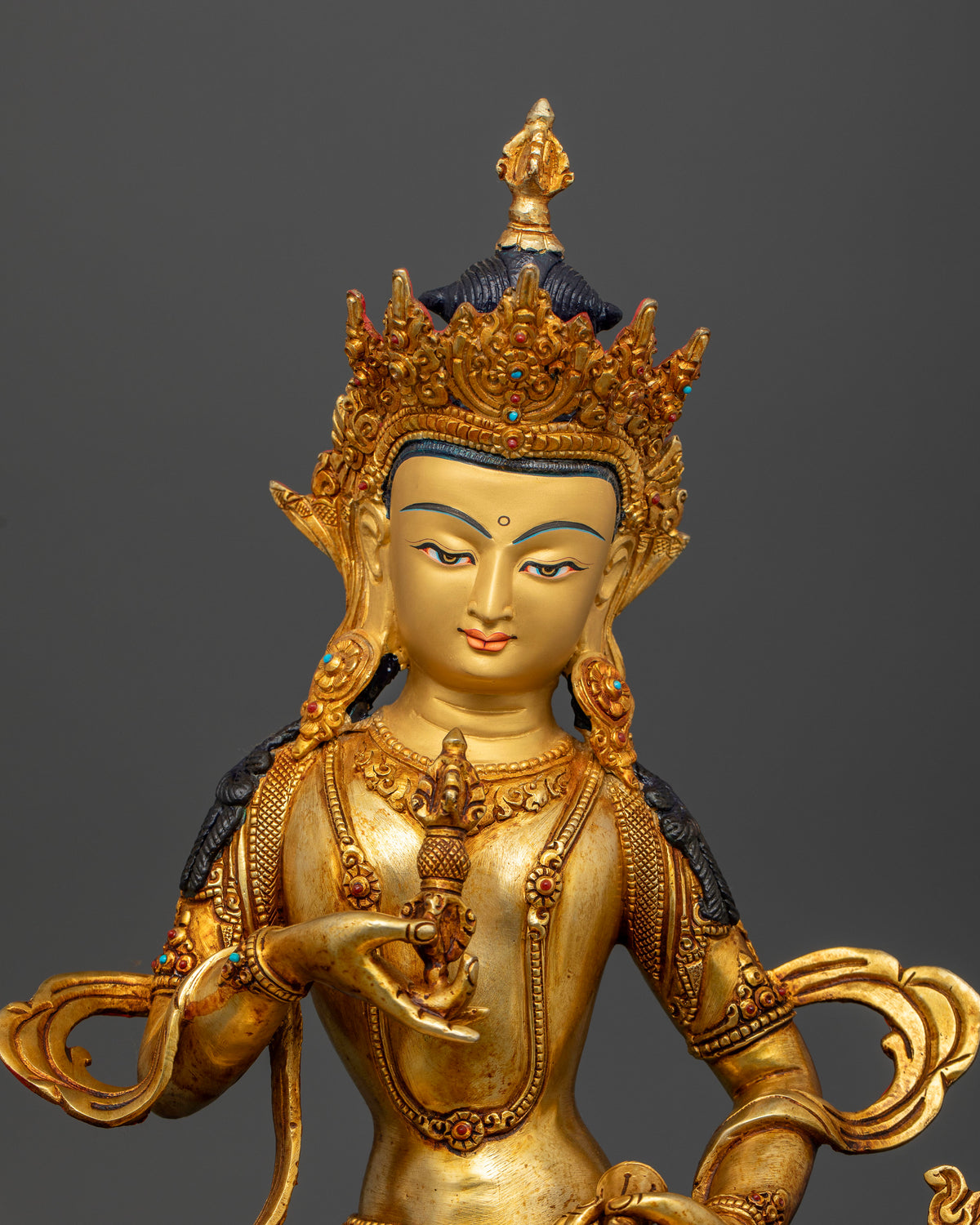 Handcrafted Vajrasattva statue from Nepal with 24K gold fire gilding and gold-painted face