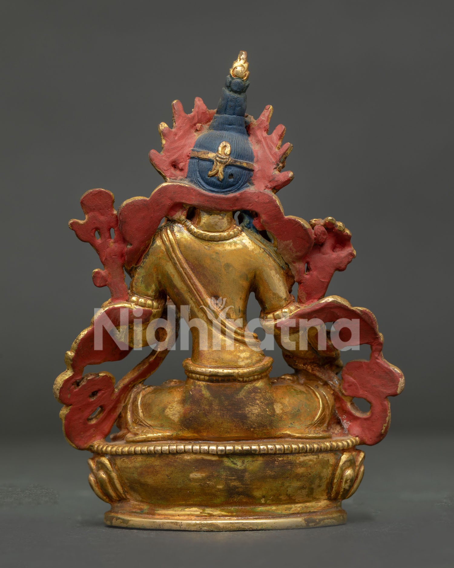 Handcrafted White Tara statue showing seven eyes gold fire gilding and Nepalese artistry.