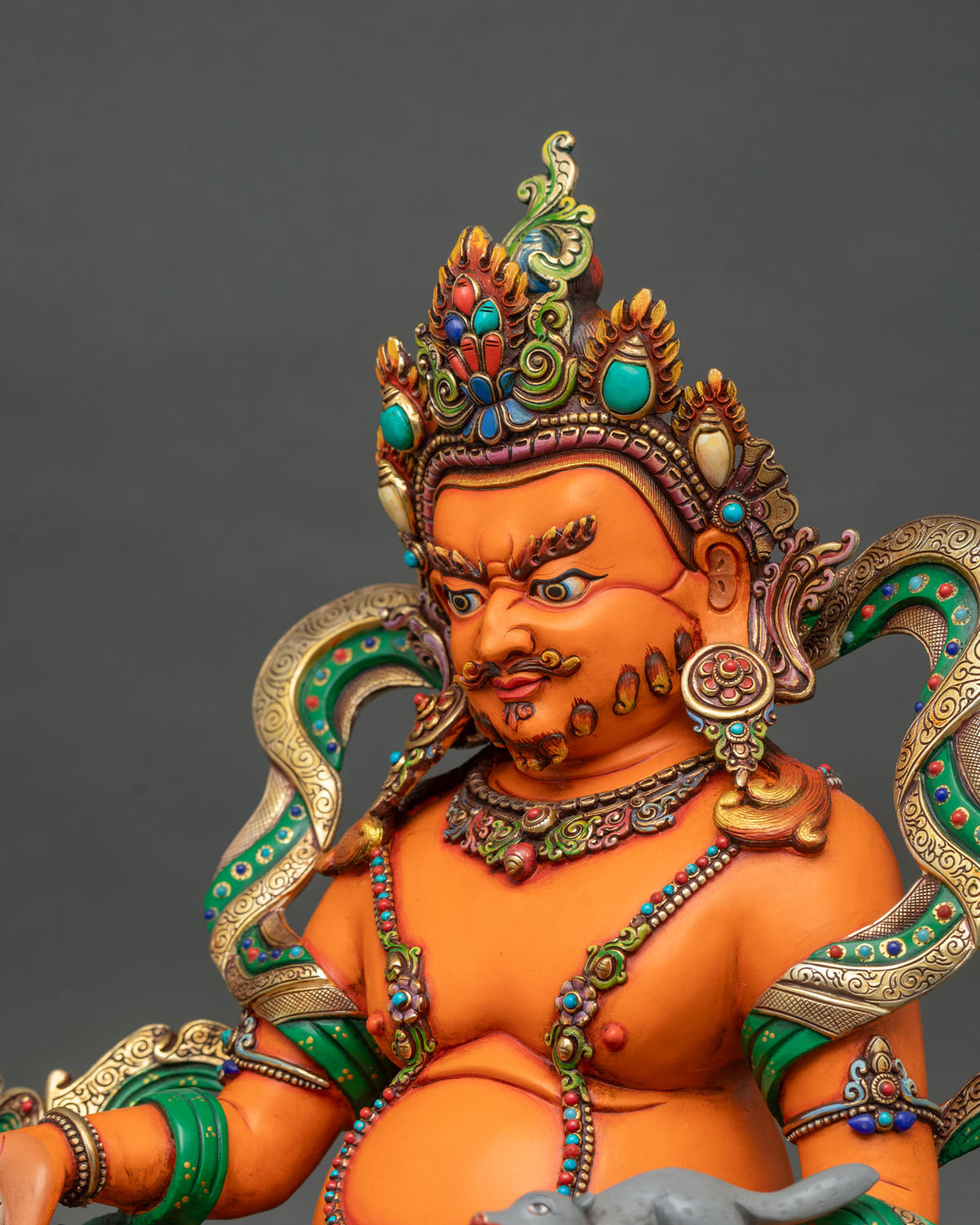 Handcrafted Yellow Dzambhala Buddhist sculpture showcasing traditional Newari craftsmanship for Buddhist altars, home shrines, and meditation spaces.