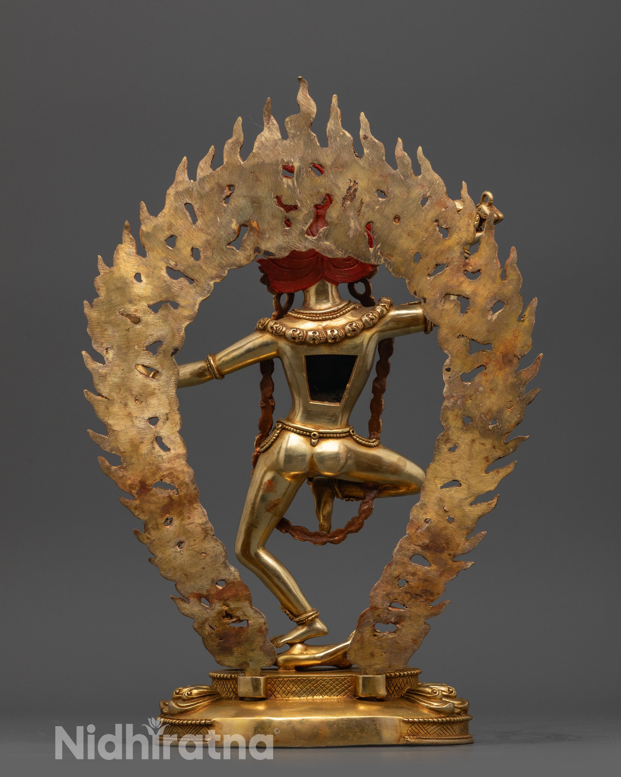 handcrafted dorje phagmo statue back view with detailed halo and flowing bone ornaments