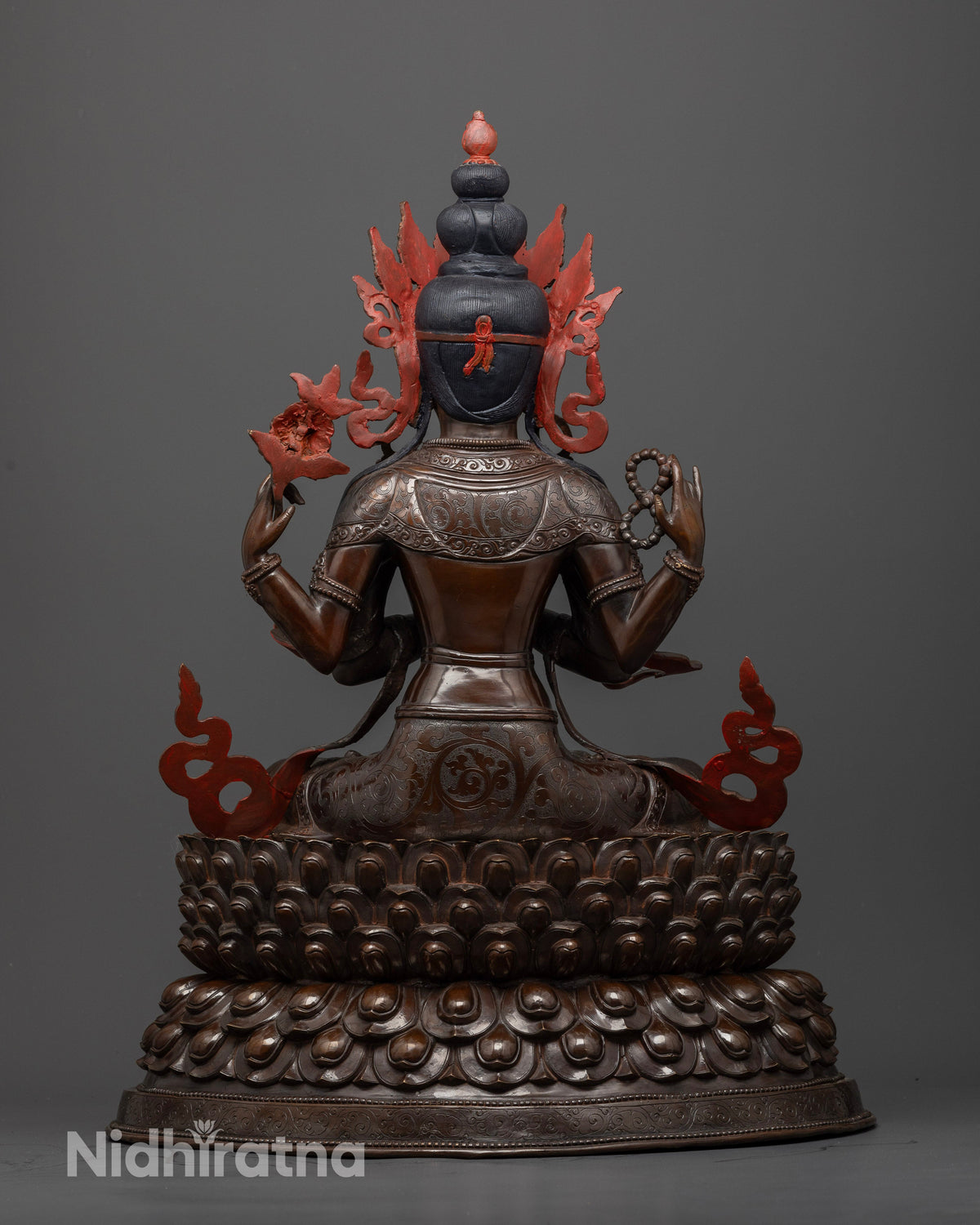 Himalayan Chenrezig sculpture made using traditional lost-wax casting with four arms symbolizing boundless compassion