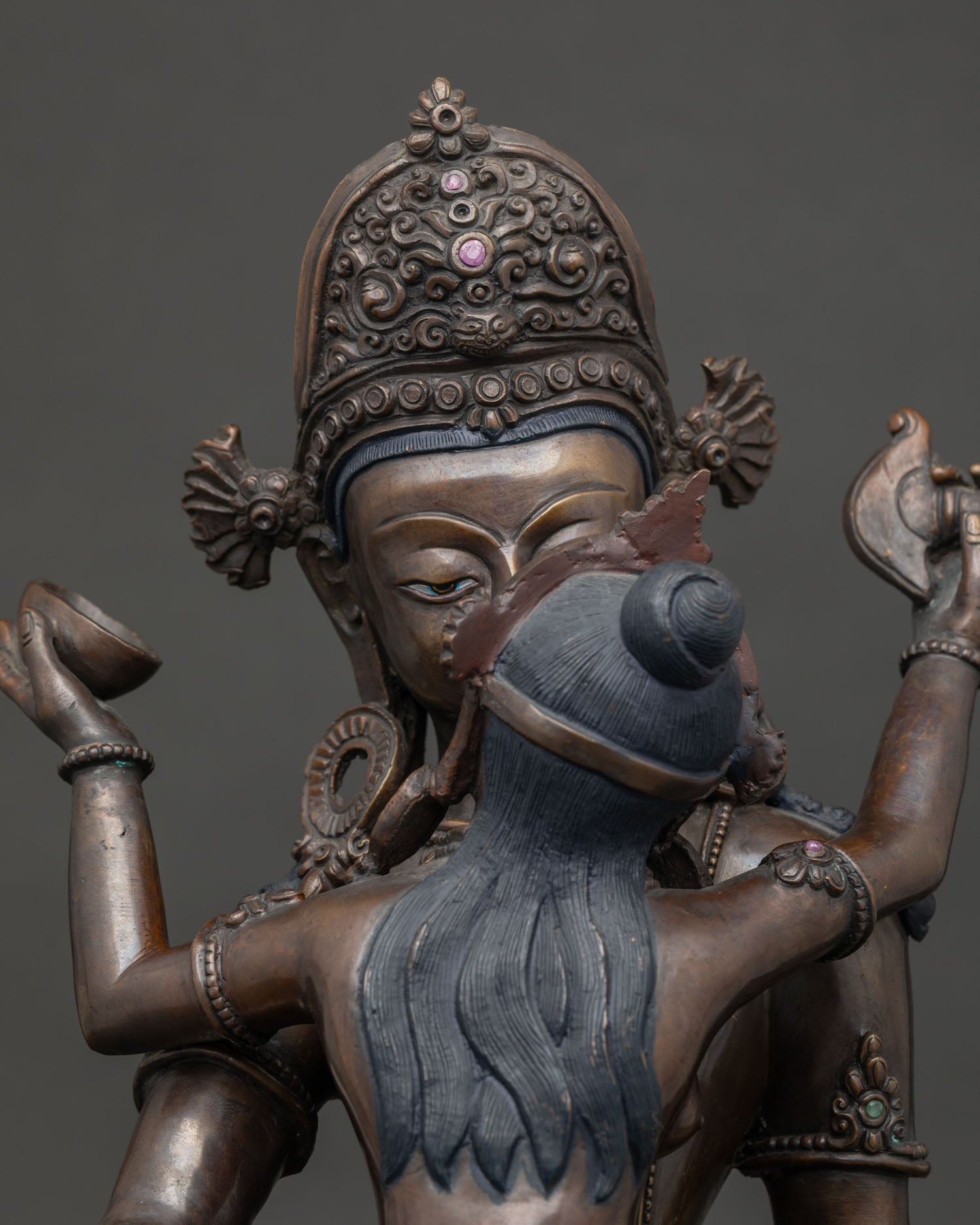 Indra consort statue with Kapala Kartika knife and detailed jewelry.