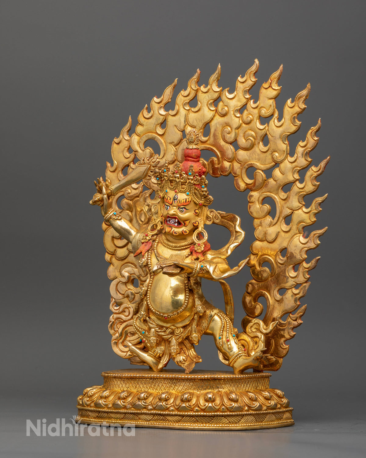 Jampel nagpo statue skull crown tiger skin garment fire halo.