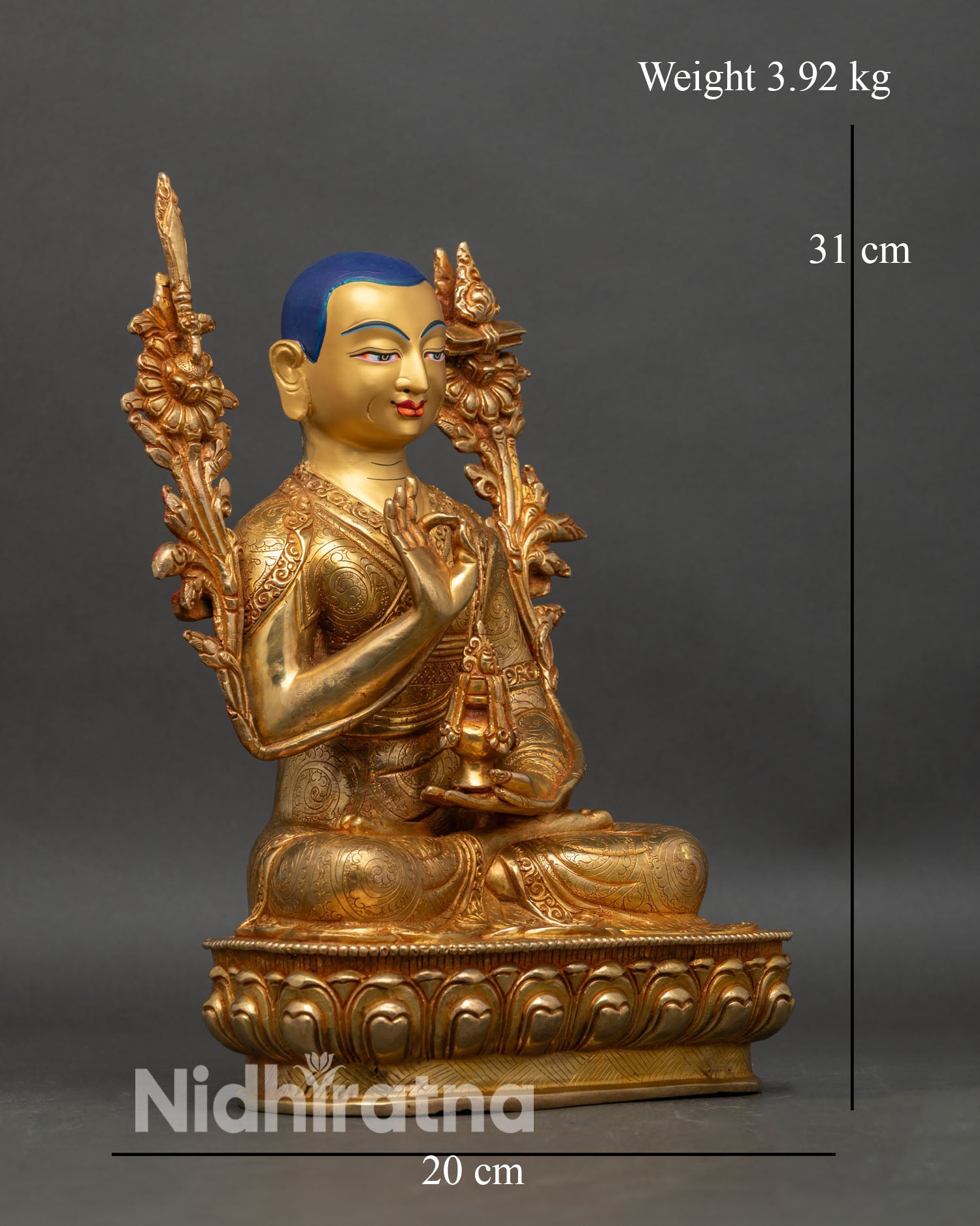 Right profile of Je Tsongkhapa statue with Sword of Wisdom and scripture lotus