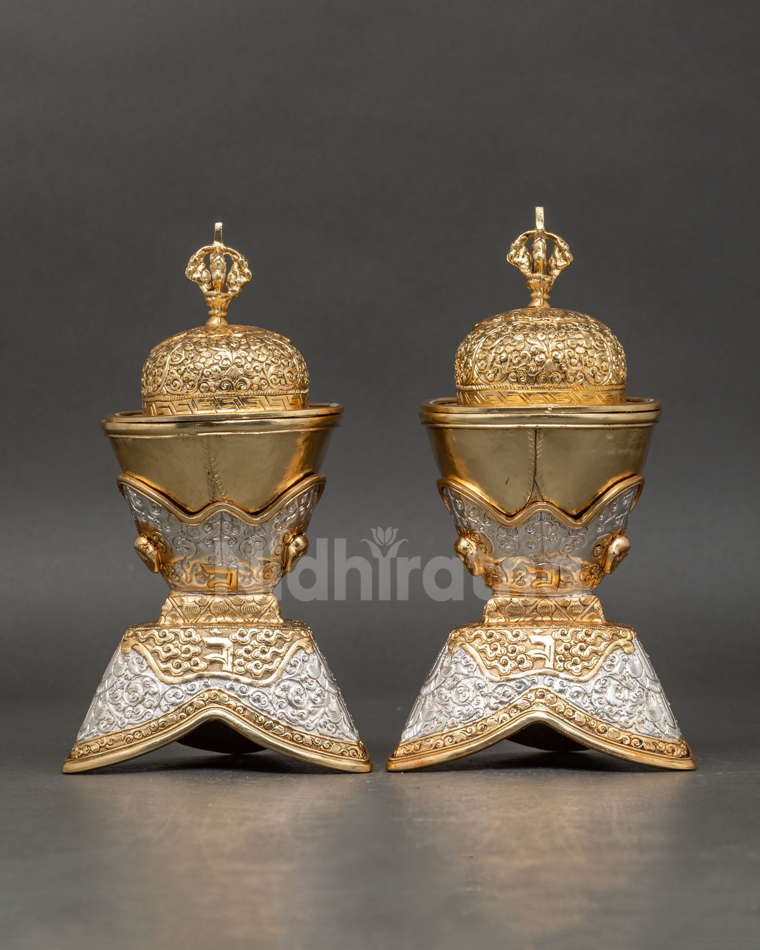 Kapala Set showing intricate filigree carvings auspicious Buddhist motifs and symbolic half vajra lid with refined Himalayan craftsmanship