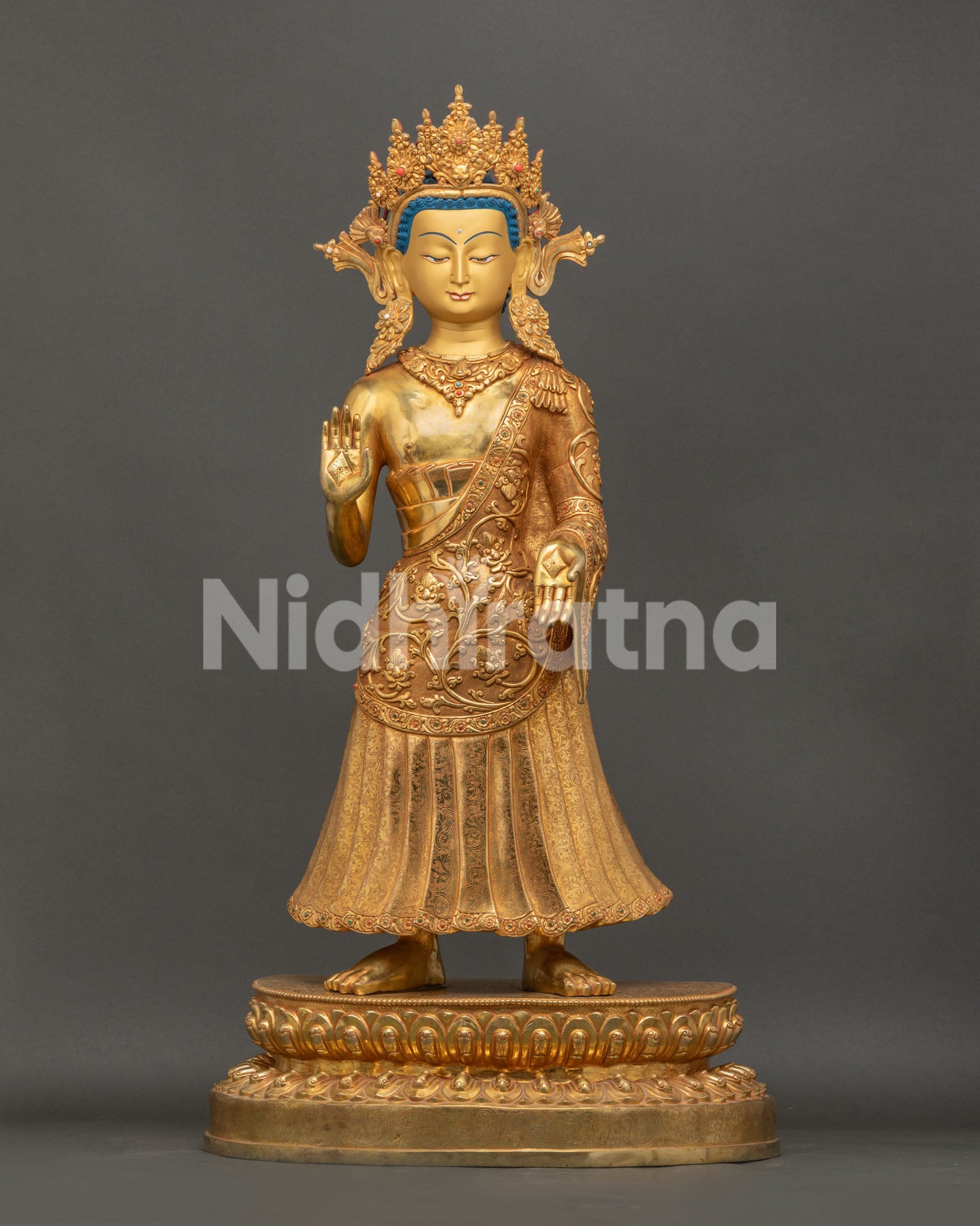 Large Dipankara Buddha statue handcrafted in Nepal with gold fire-gilded copper finish front view