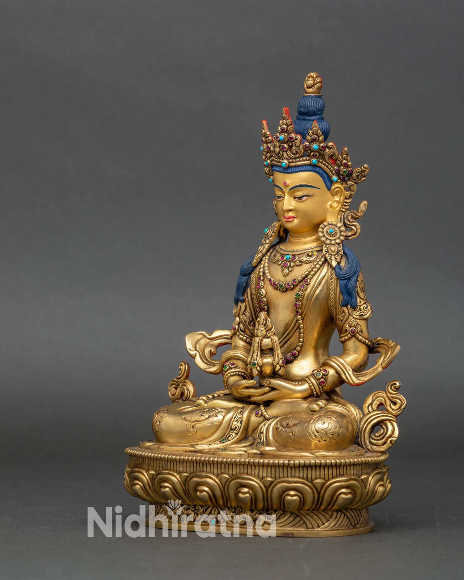 Left profile of Amitayus Bodhisattva statue, adorned with semi-precious stones