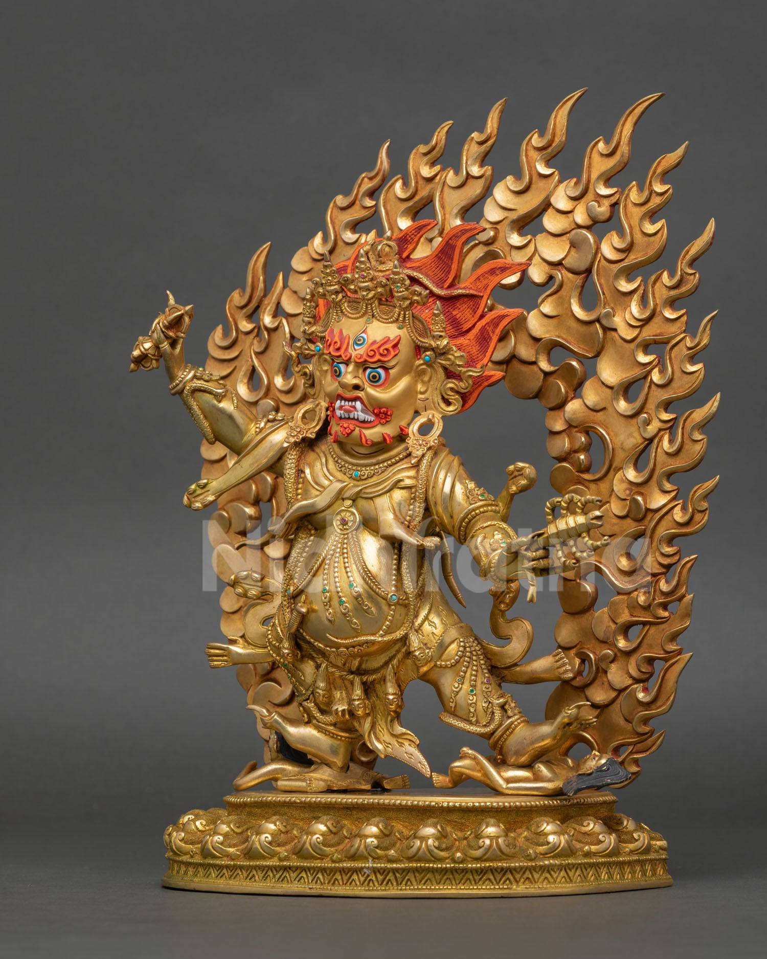 Left profile of Guru Dragpo Buddhist sculpture with handcrafted copper artistry