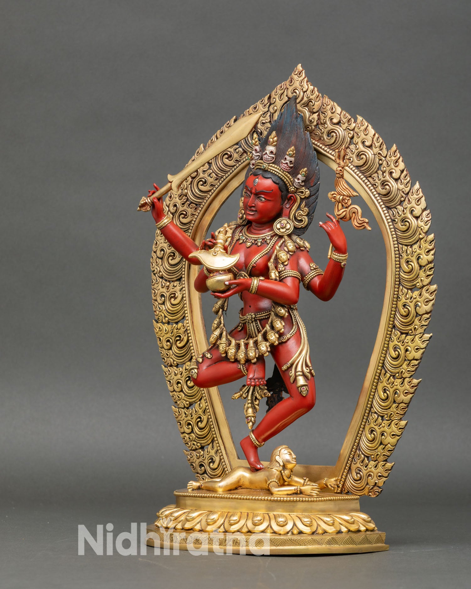 Left profile of Maha Vajravarahi statue with khatvanga and sword, Tibetan tantric goddess artwork