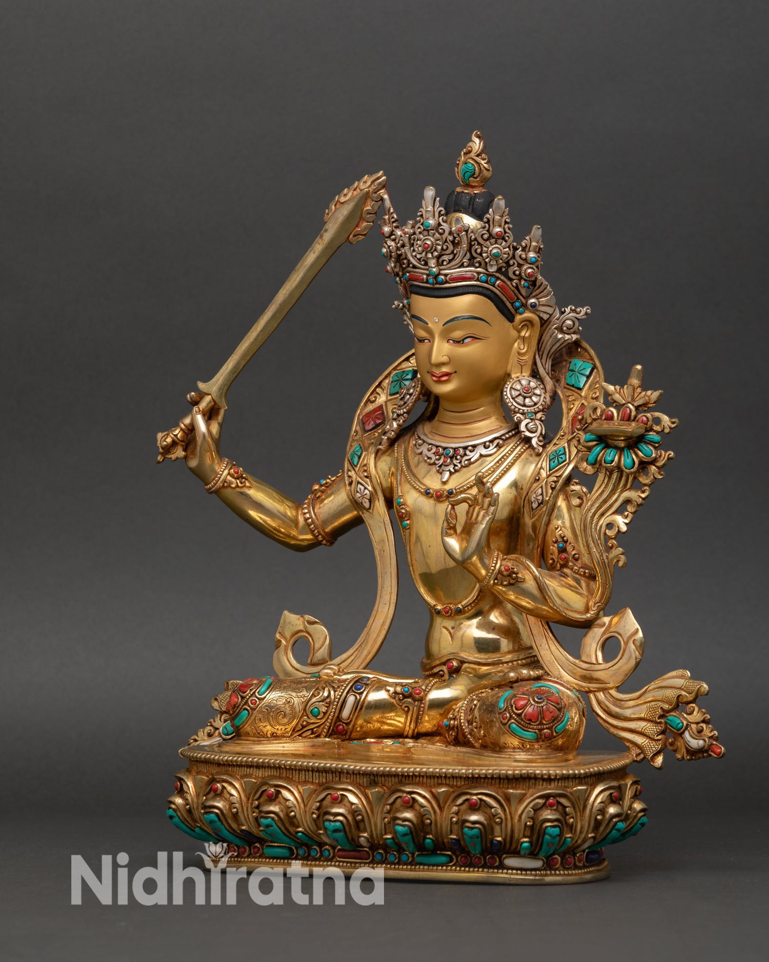 Left profile view Manjushri statue, copper alloy body, gold gilded sacred Buddhist art from Nepal