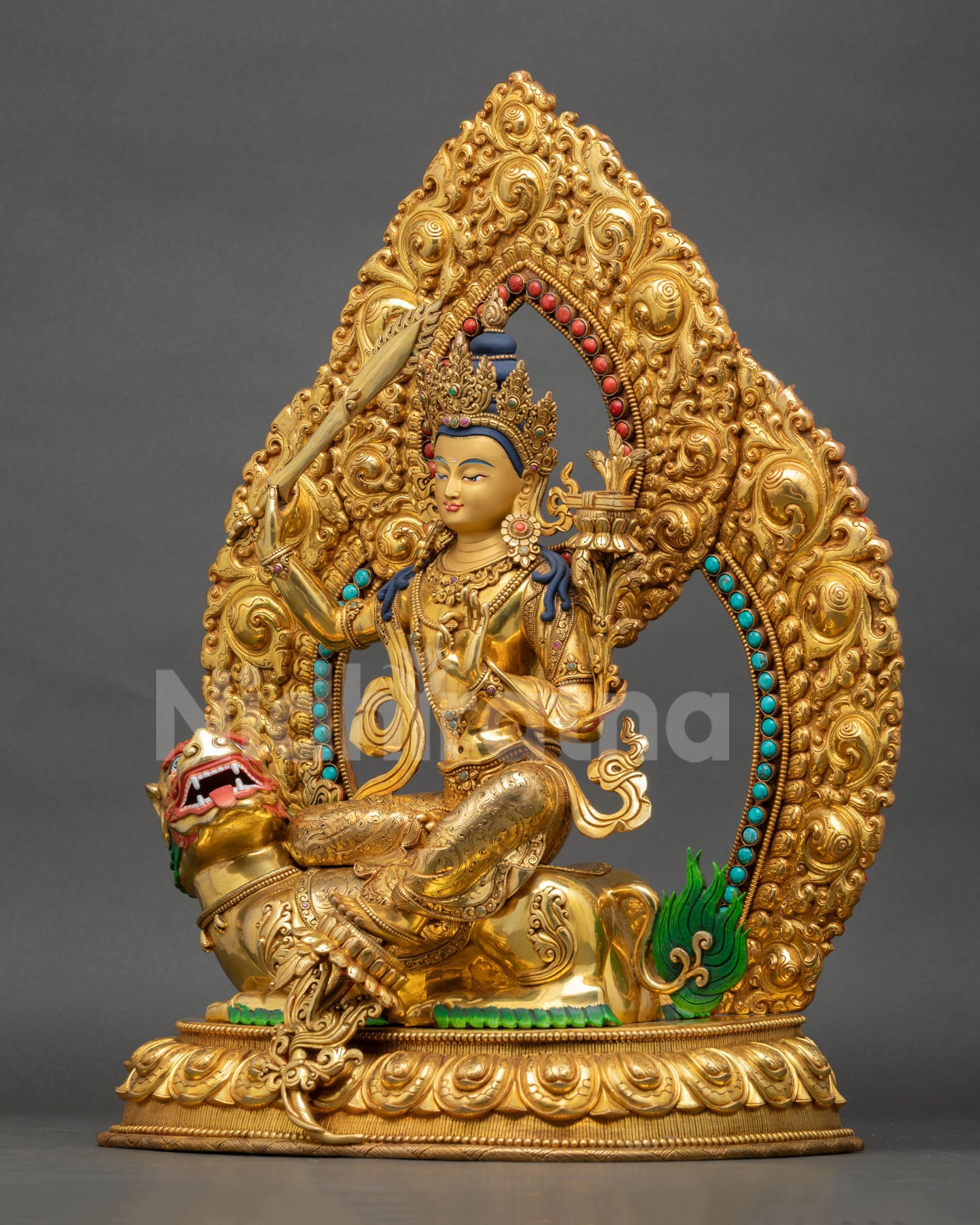 left profile view of simhanada manjushri bodhisattva, utpala stems and sacred scripture