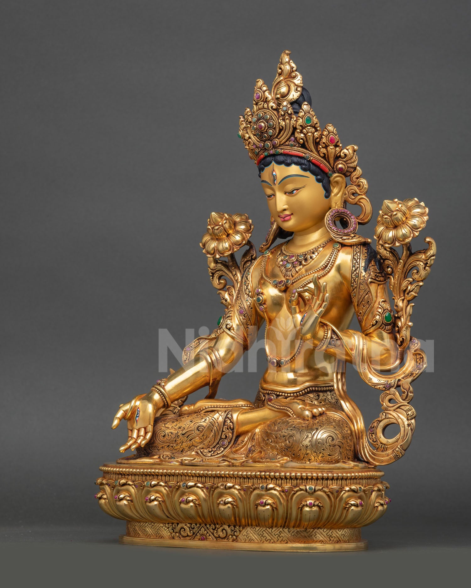 left profile white tara statue fine engraved details gold gilded himalayan buddhist sculpture