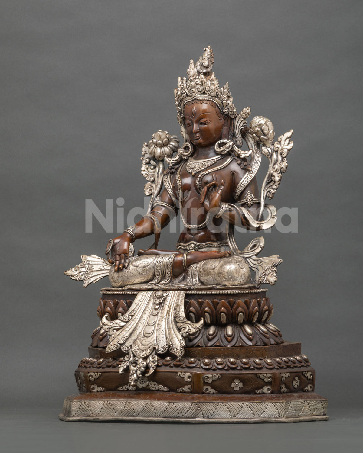 Left side handcrafted White Tara statue detailed robes and ceremonial ornaments