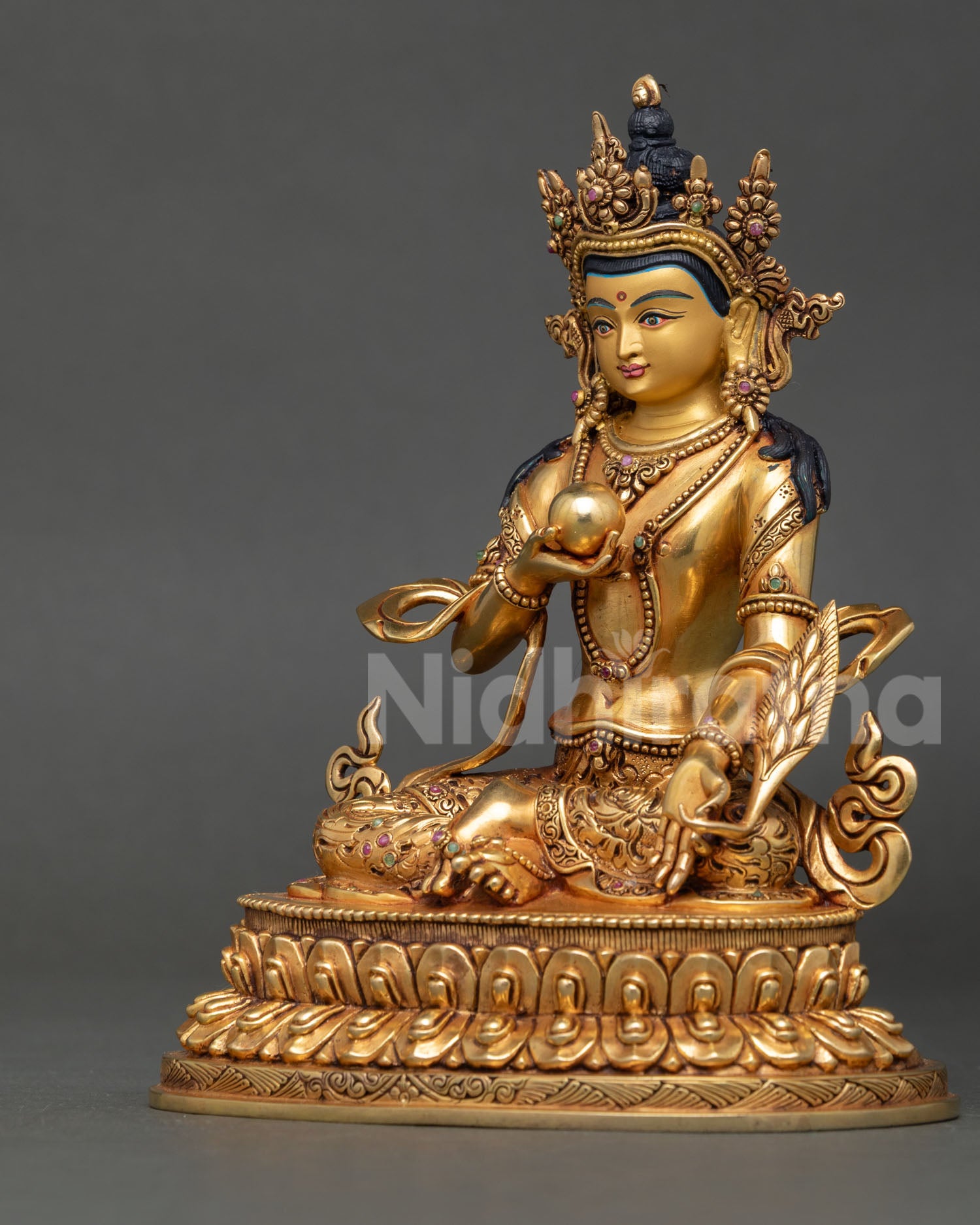 Left-side profile of Ksitigarbha Bodhisattva Statue showing ornate robes and gilded details