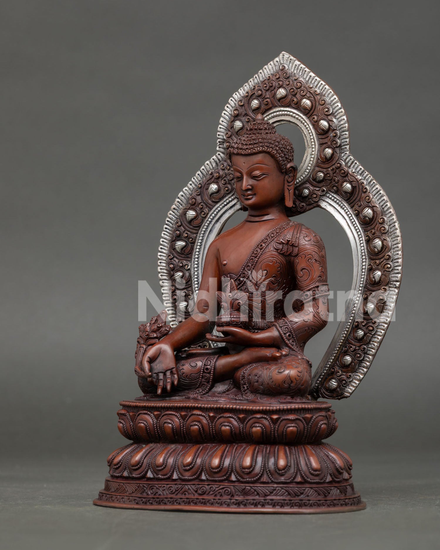 left side view of bhaisajyaguru statue handcrafted by nepali artisans