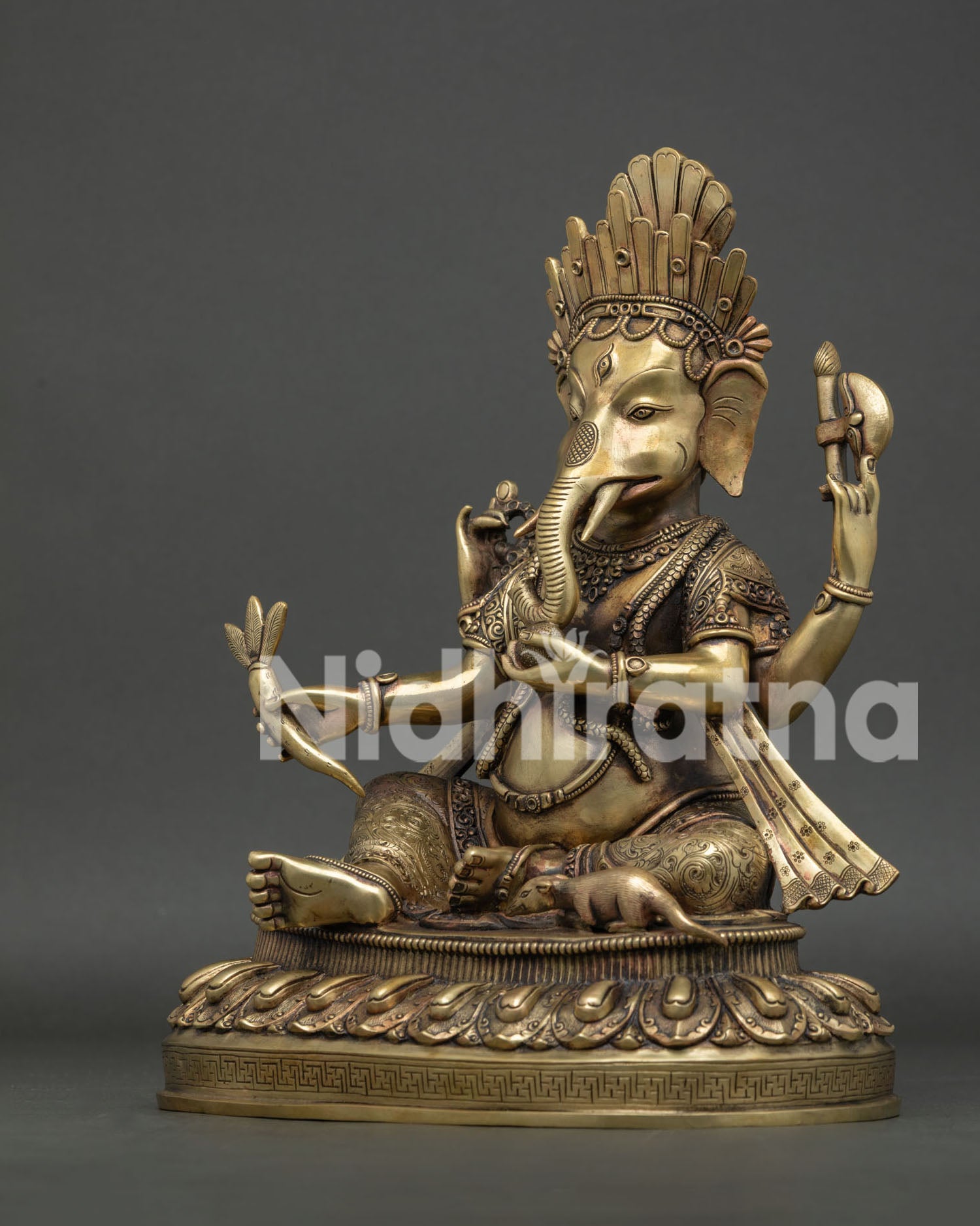Left side view of copper Ganesh statue, handcrafted in Nepal using lost-wax method
