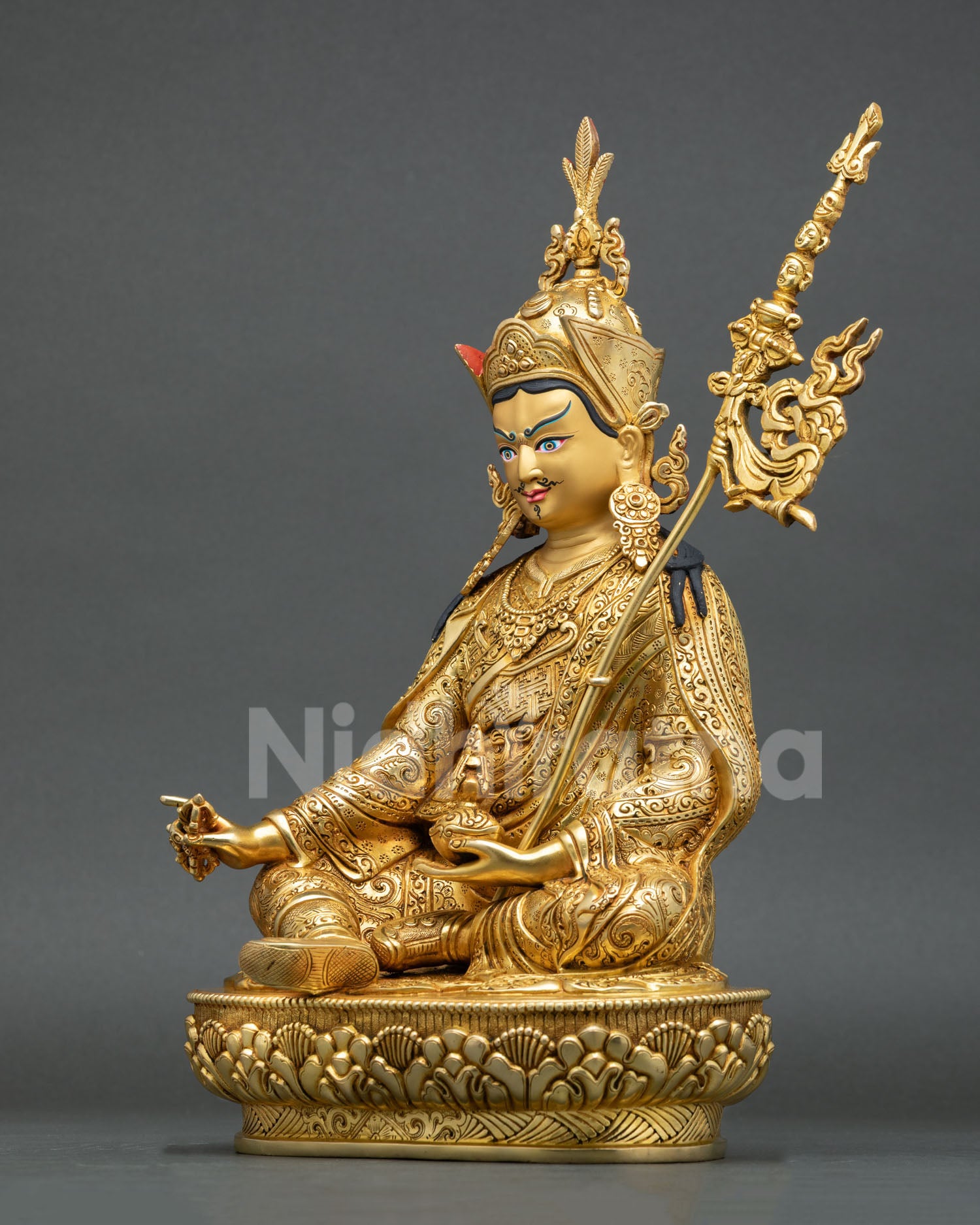 Left Side View of Guru Padmasambhava Statue with Khatvanga and Lotus Seat