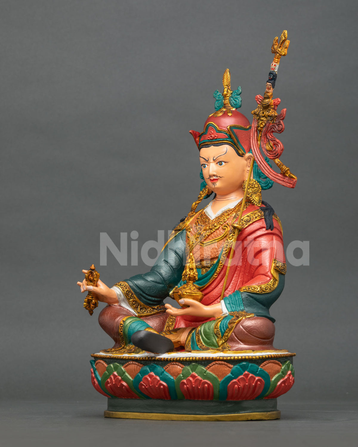 Left side view of Guru Rinpoche statue, Padmasambhava holding Khatvanga staff, handcrafted in Nepal