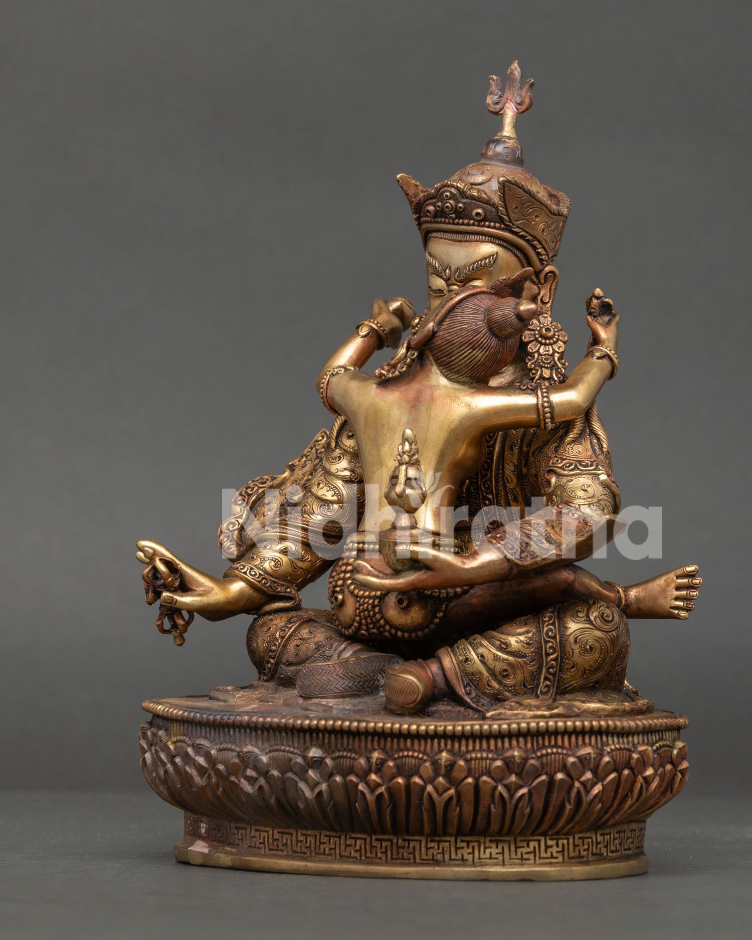 Left side view of Guru Rinpoche Yab Yum Statue in pure copper from Nepal