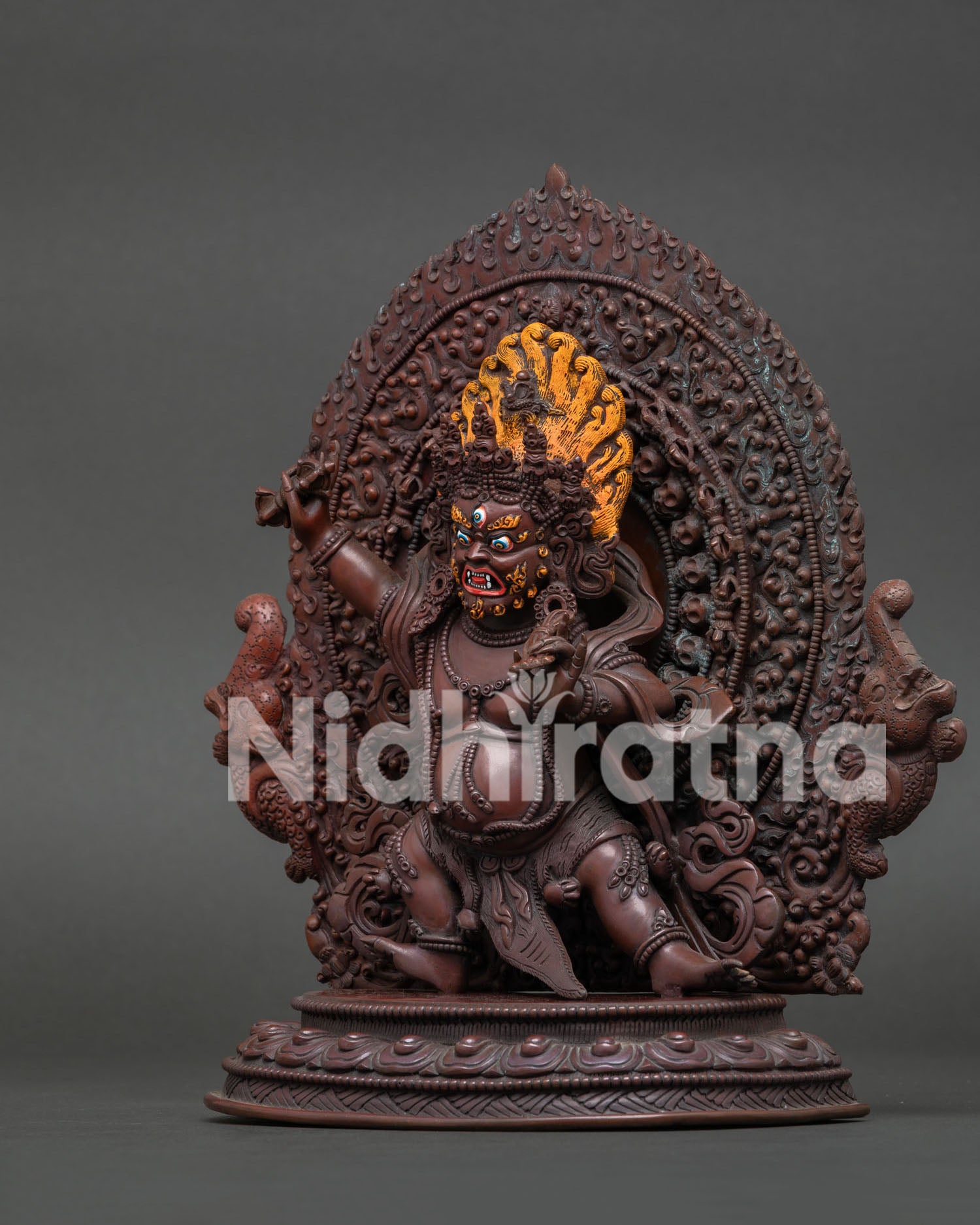 Left Side View of Hand-Carved Vajrapani Statue with Intricate Carved Buddhist Details