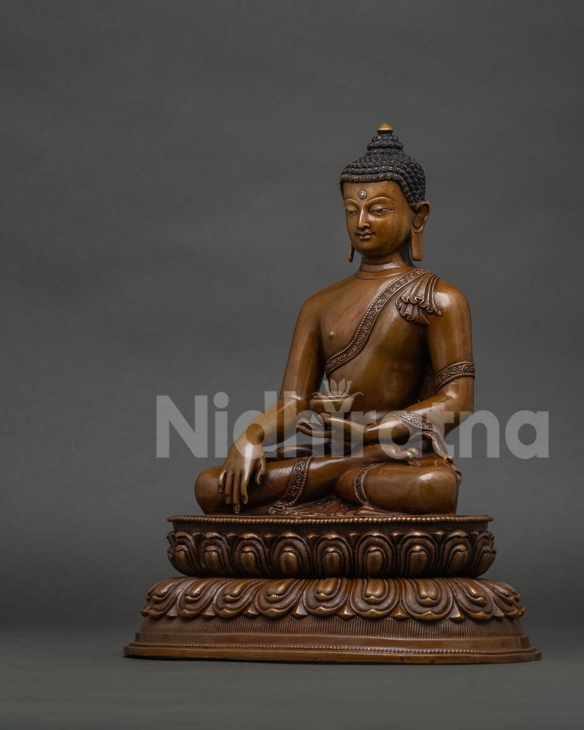 left side view of handcrafted shakyamuni buddha copper statue