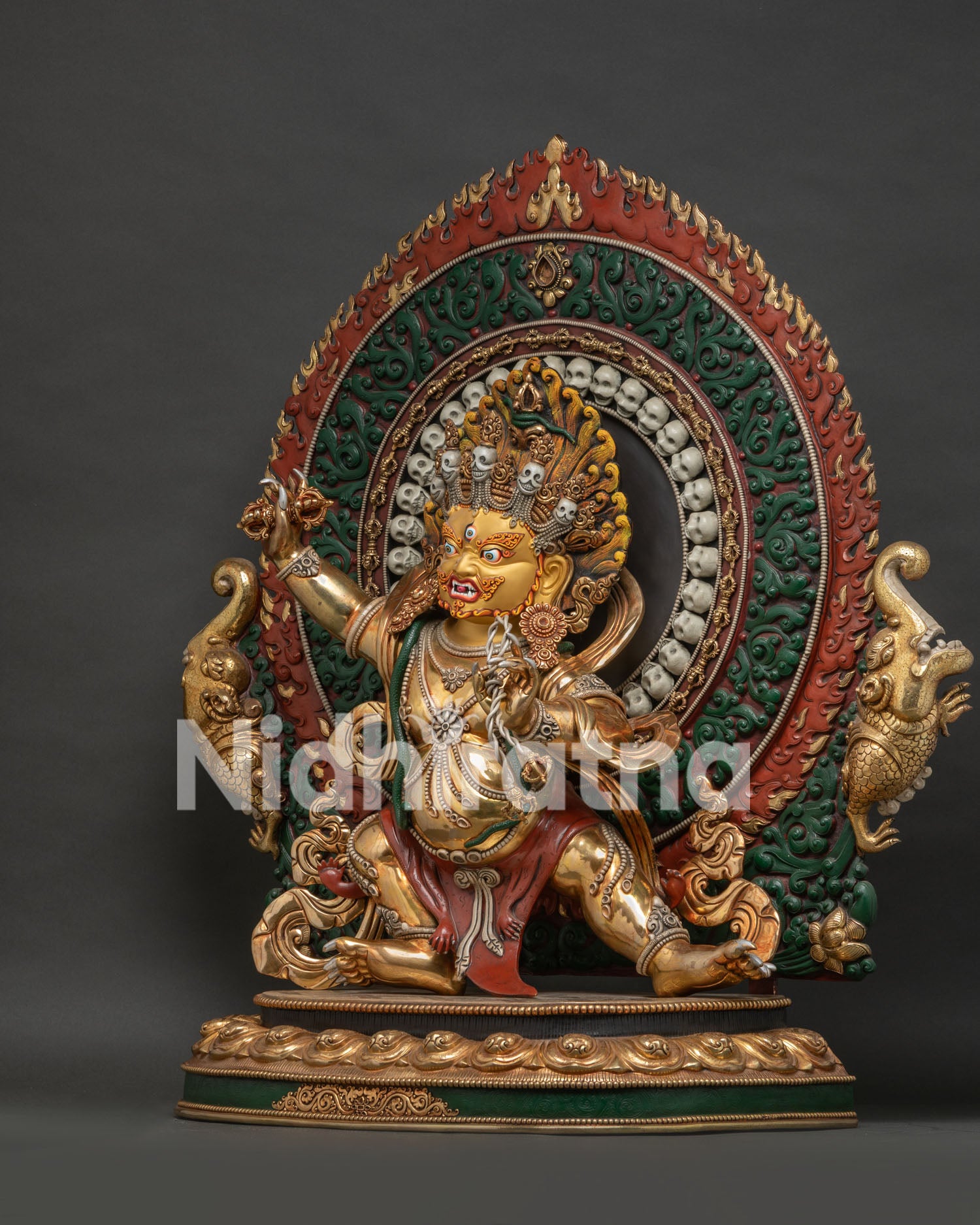 Left side view of handmade Vajrapani statue, gold-gilded copper Nepal