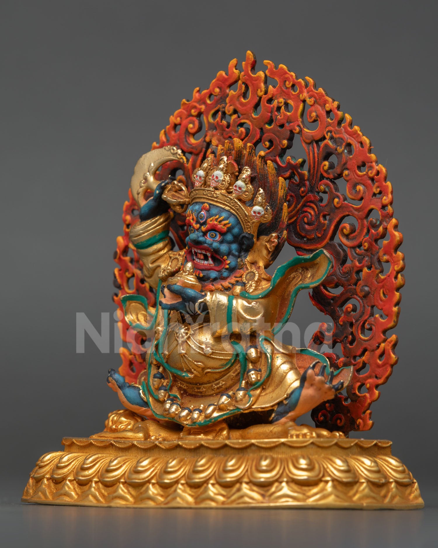 Left side view of Mahakala Bernagchen Statue, wrathful protector deity, lost wax copper craftsmanship from Nepal