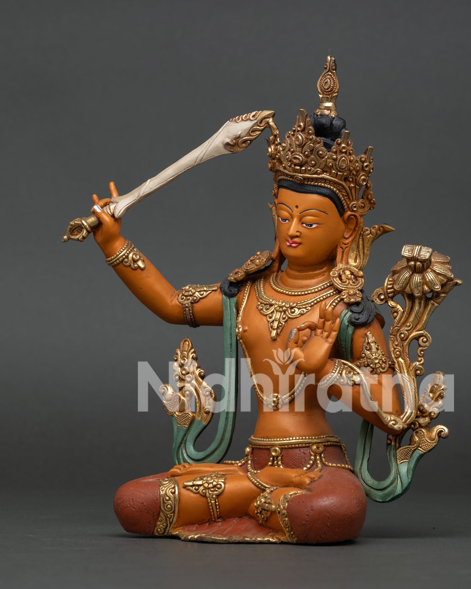 Left side view of Manjushri Statue, utpala flower and Prajnaparamita scripture