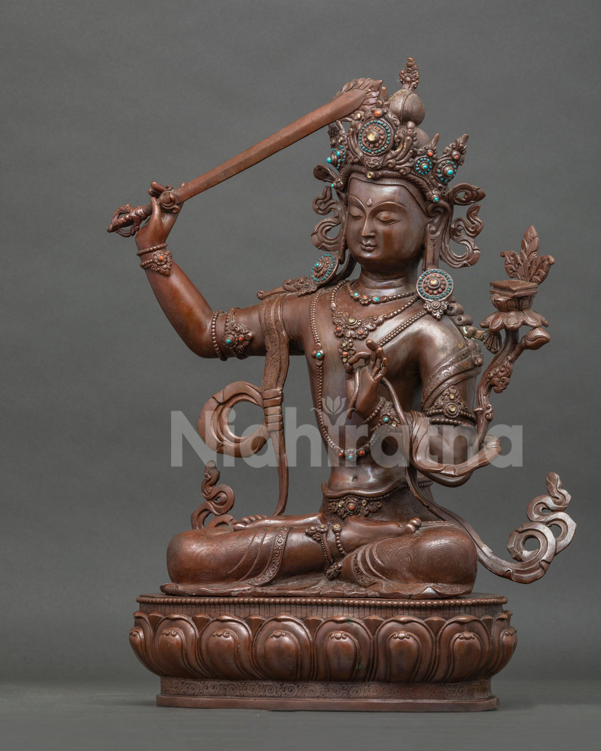 Left Side View of Oxidized Copper Manjushri Statue – Handmade Bodhisattva Nepal