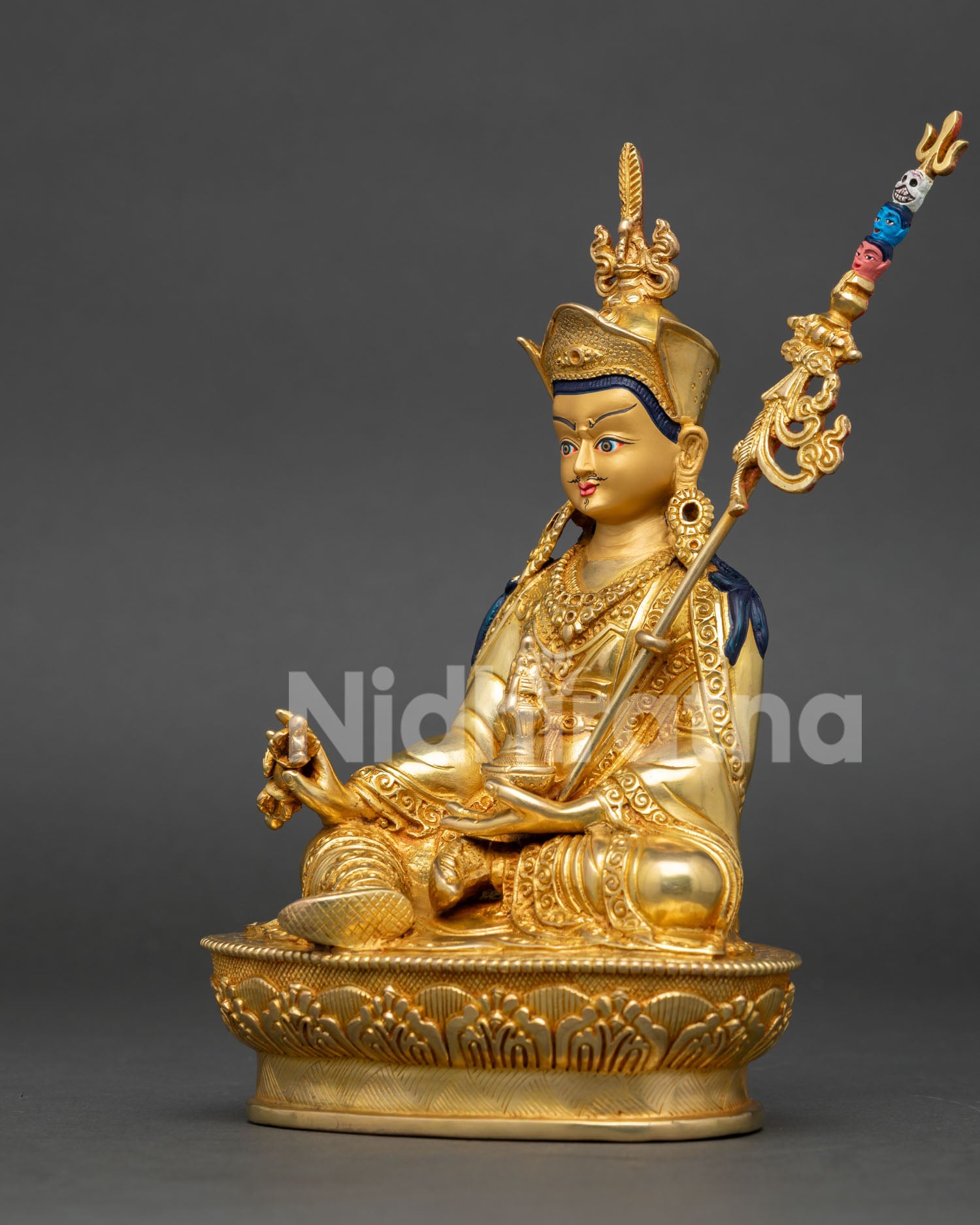 Left side view of Padmasambhava statue displaying handcrafted Nepalese sculpture details