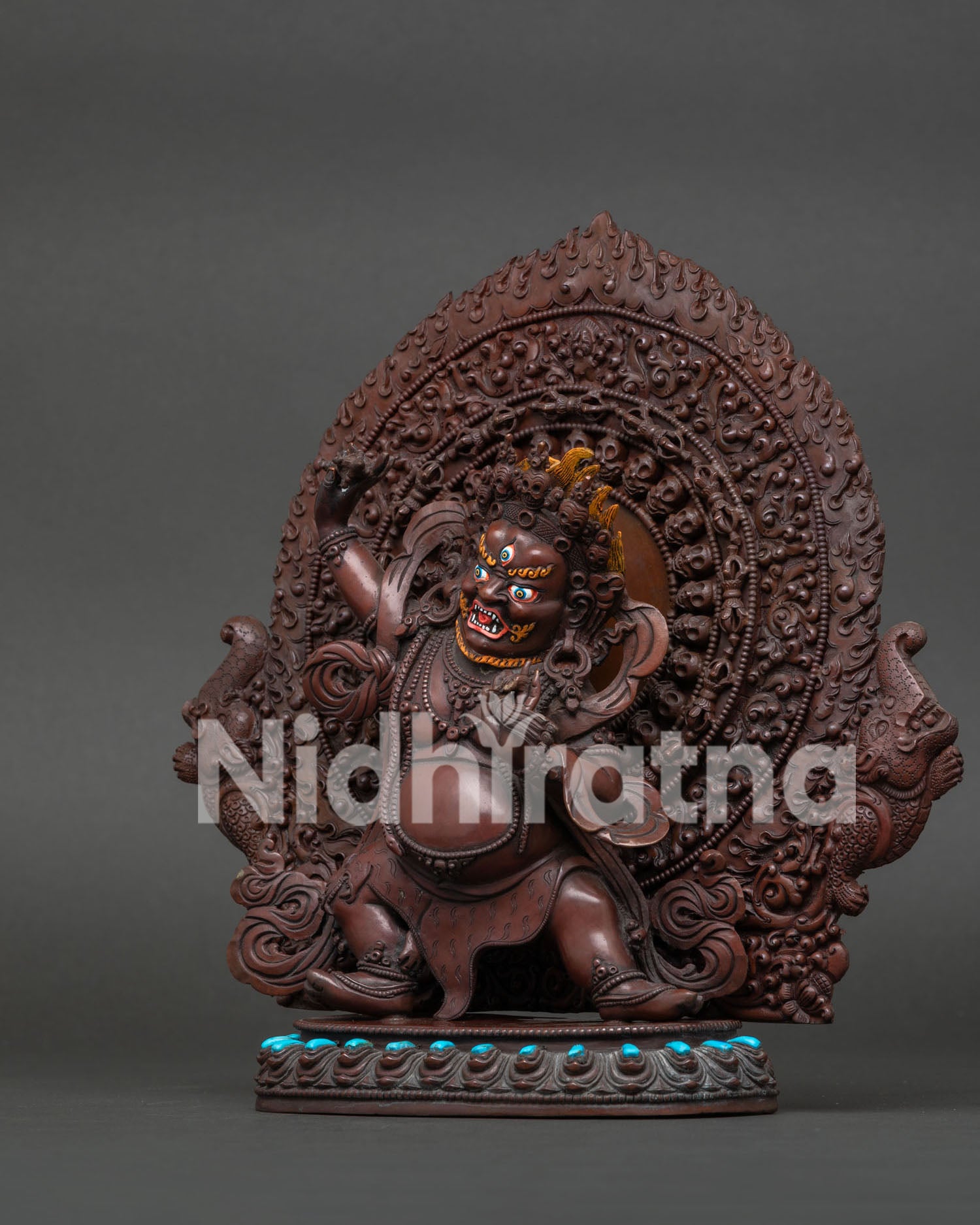 Left Side View of Sacred Vajrapani Statue with Lotus Base and Intricate Metalwork