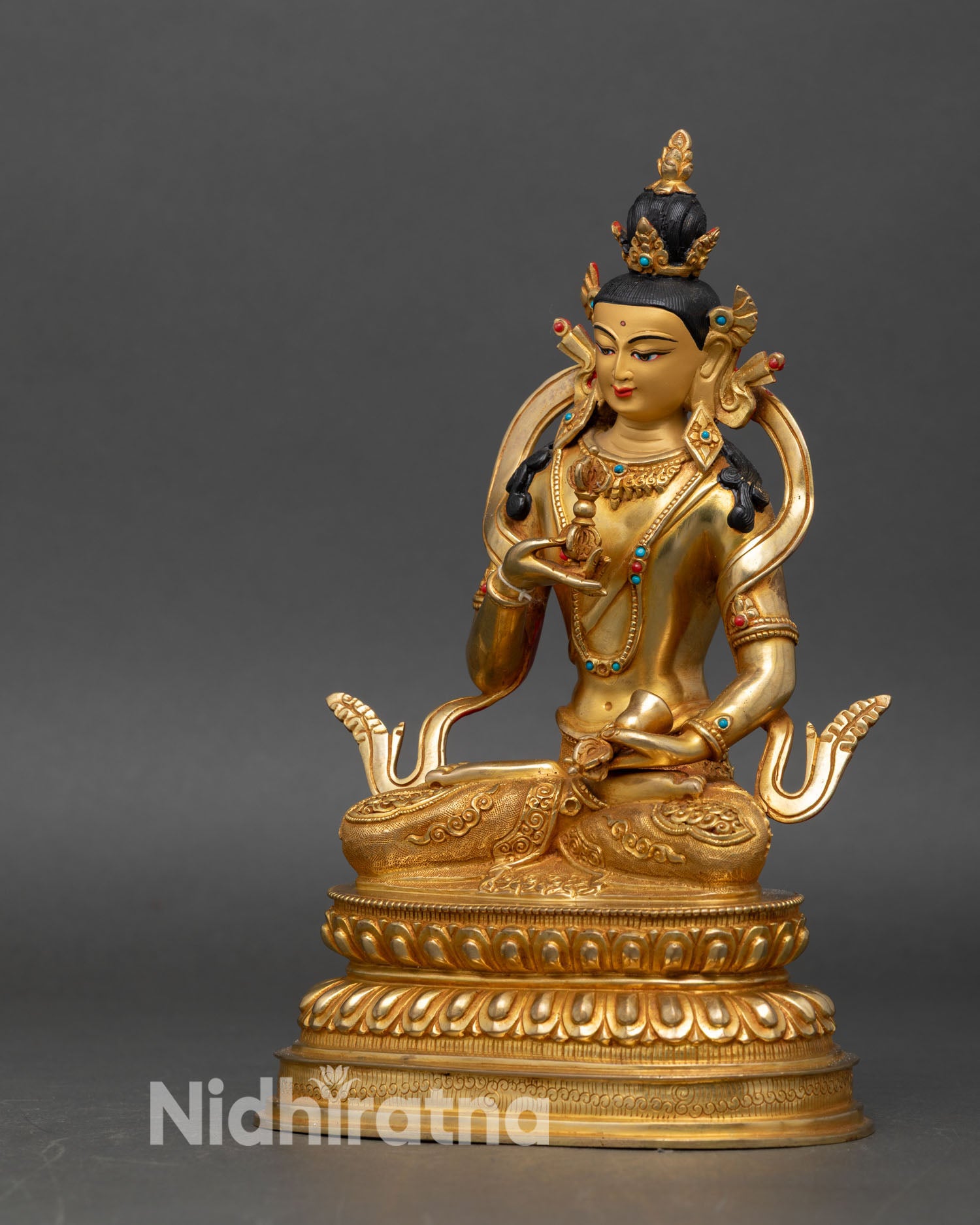 left side view of vajrasattva buddhist statue with fire-gilded copper craftsmanship