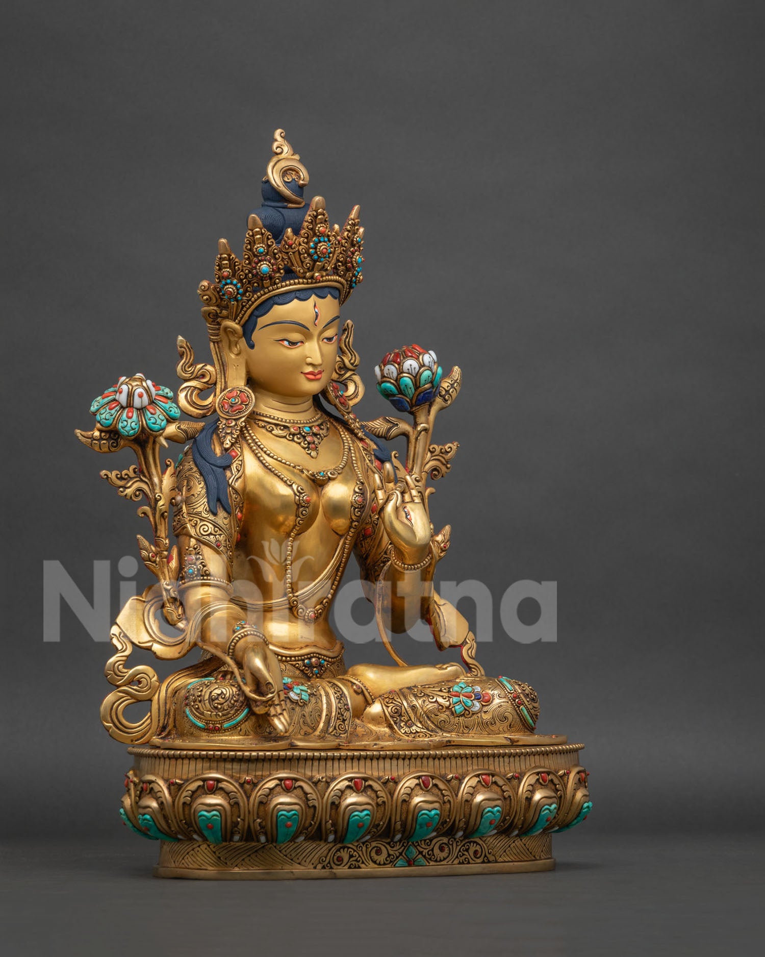 Left side view of White Tara statue, handcrafted Himalayan sculpture