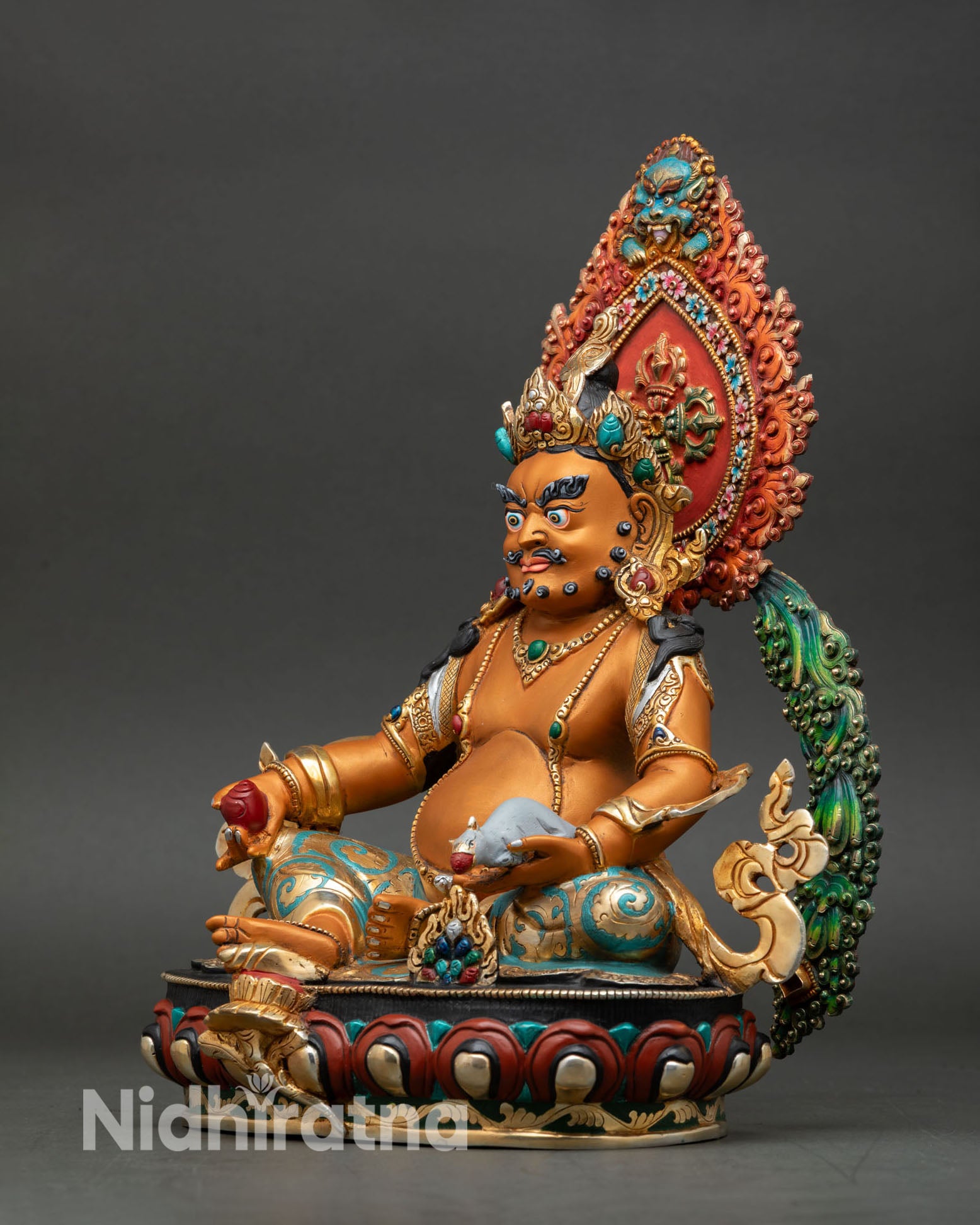 left side view of yellow dzambhala statue buddhist prosperity deity statue handcrafted nepal ritual art with lotus throne