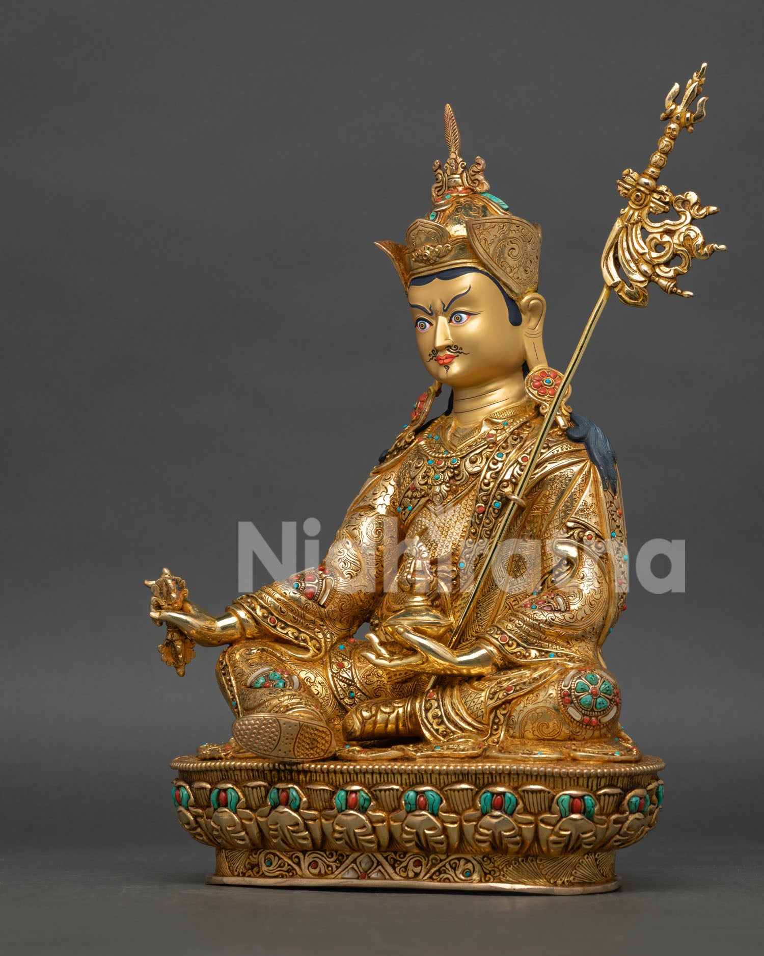 Left Side View Padmasambhava Statue with Khatvanga Trident Detail