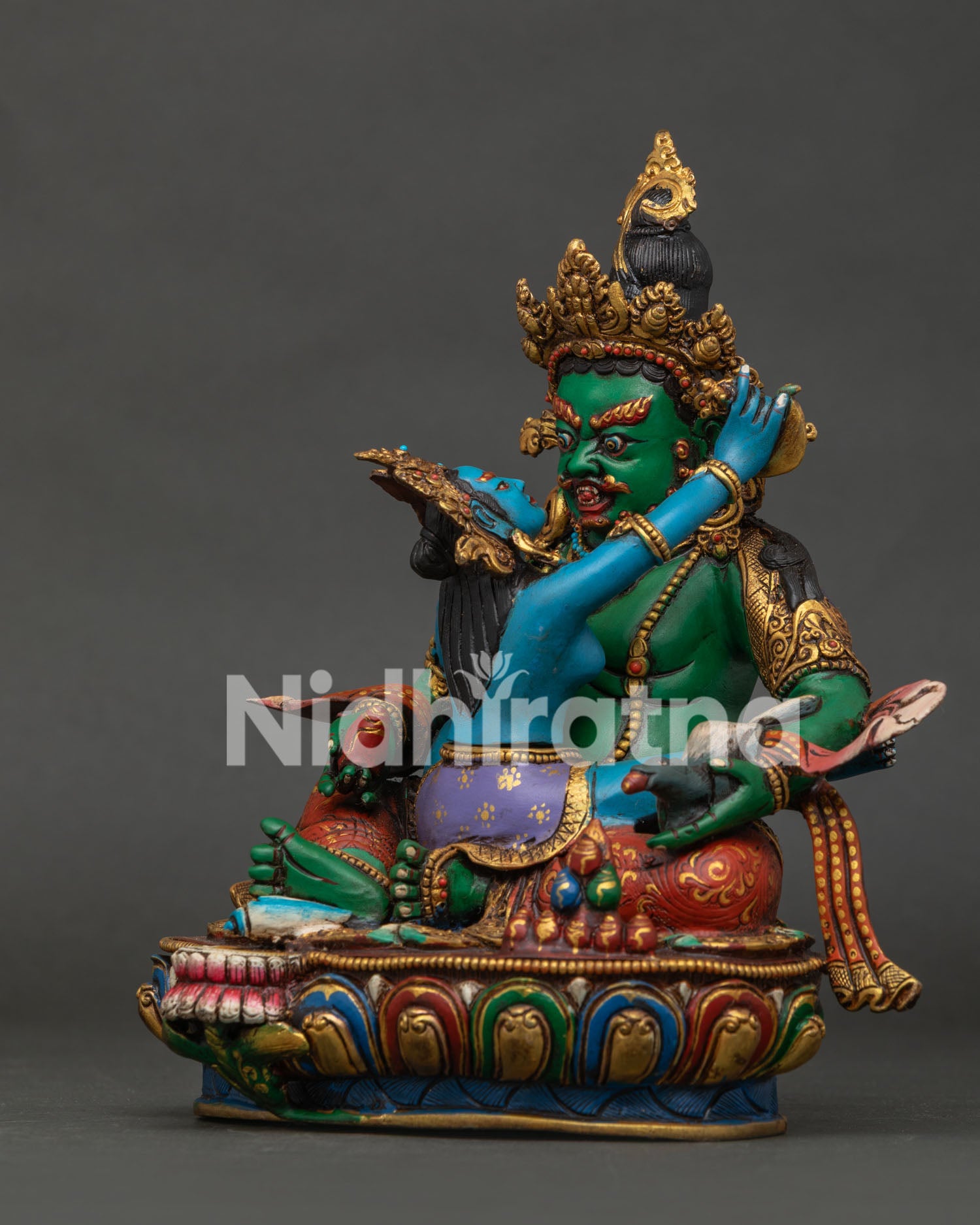 left side view showcases the intricate details of the Jangku Dzambhala statue