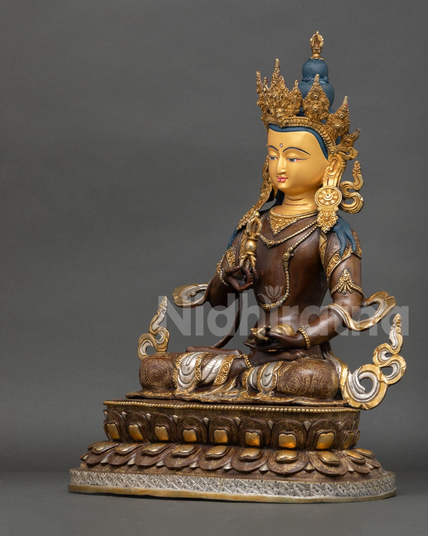 Left side view Vajrasattva statue detailed ornaments lotus seat Buddhist deity Nepal art