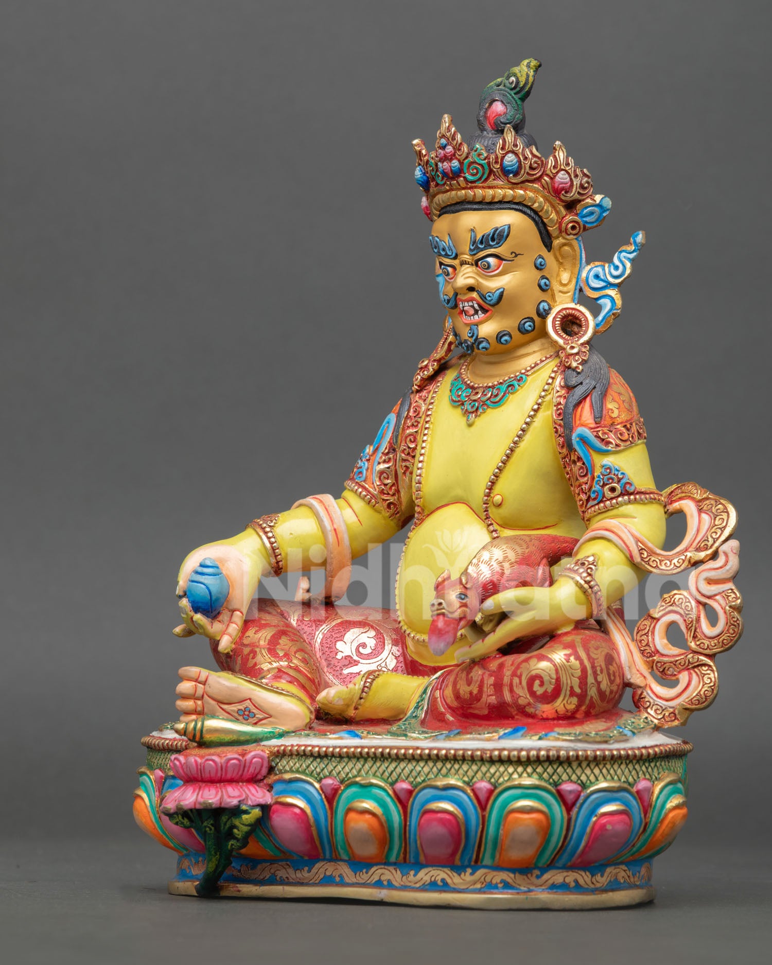 left view dzambhala statue nepalese buddhist sculpture lotus seat spiritual wealth god