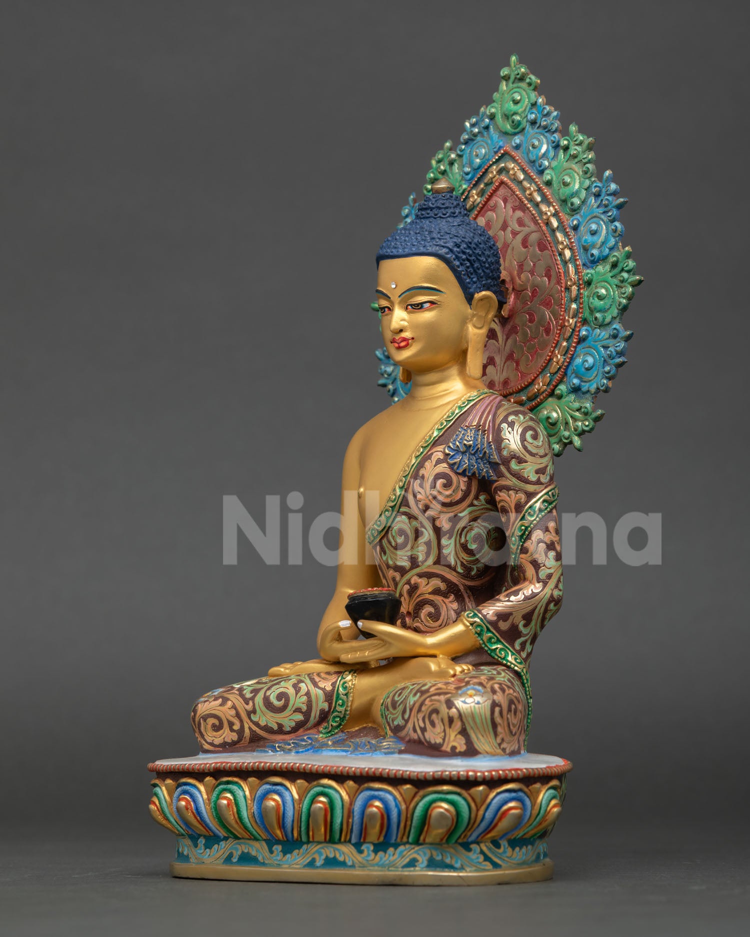 left view of Amitabha Buddha sculpture with colorful lotus throne