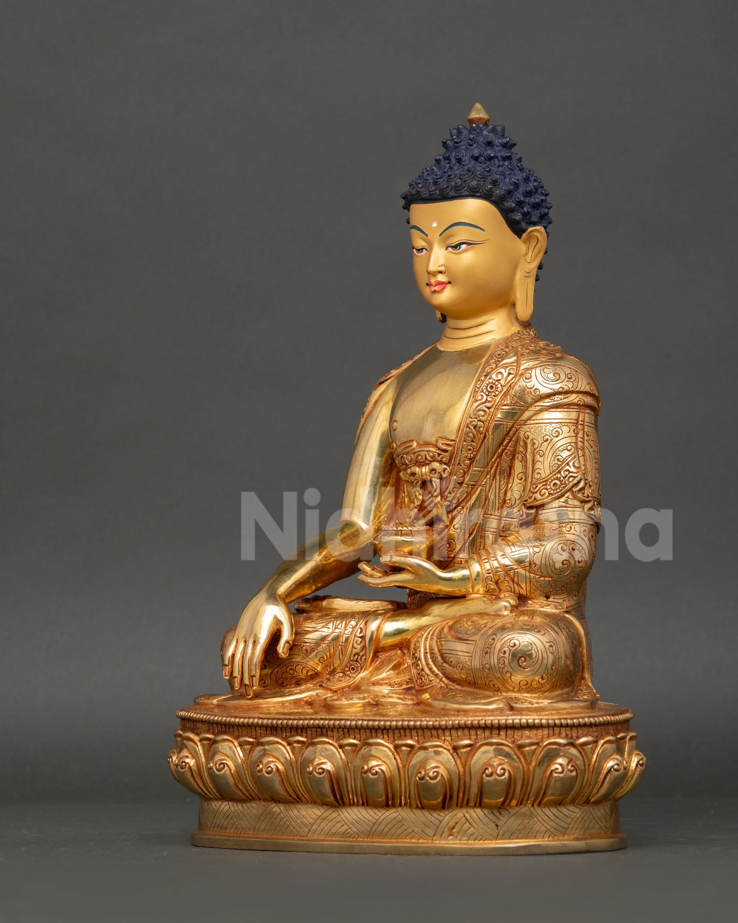 Left View Side Left side Shakyamuni Buddha statue, fire-gilded copper, engraved robes, Newari artisan Patan Nepal